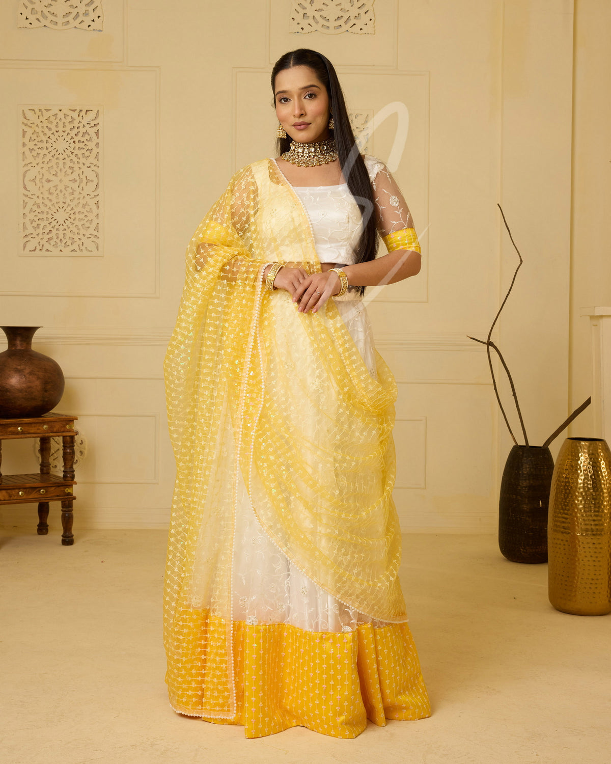 An elegant white and yellow lehenga