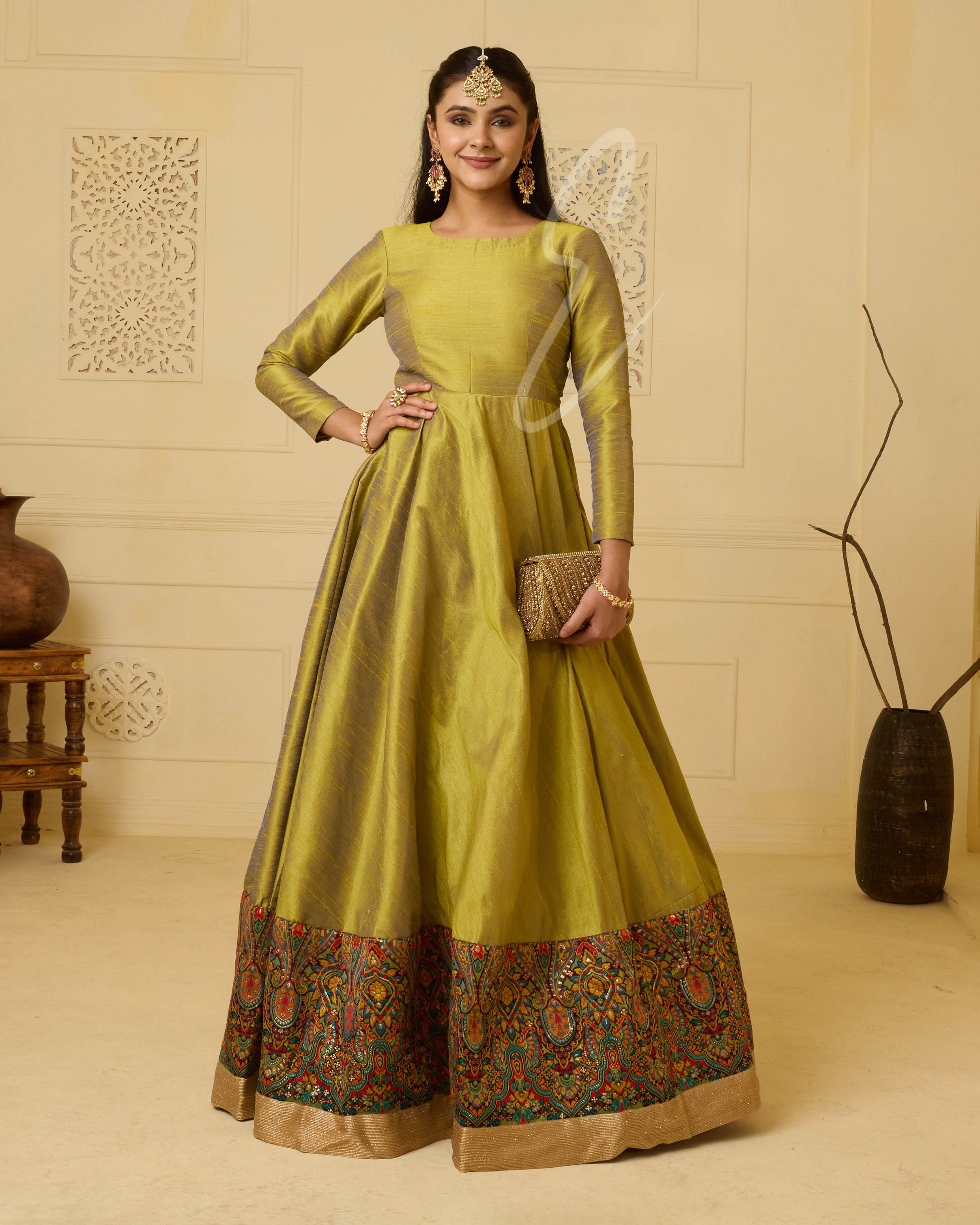 A premium raw silk gown in green