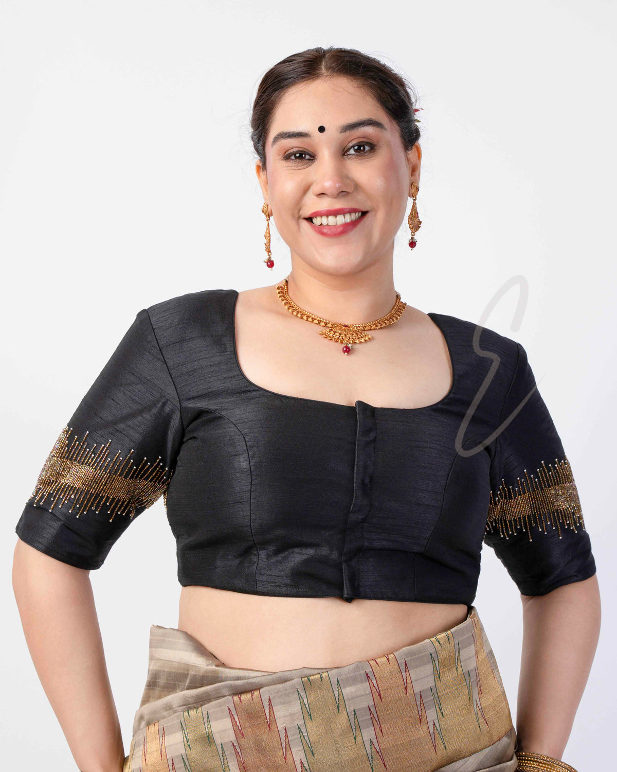 black raw silk blouse designed in a princess-cut style