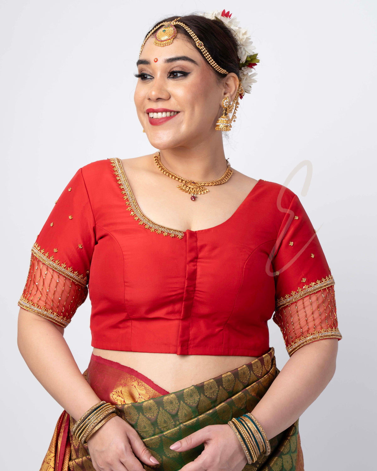 A red silk cotton net blouse designed
