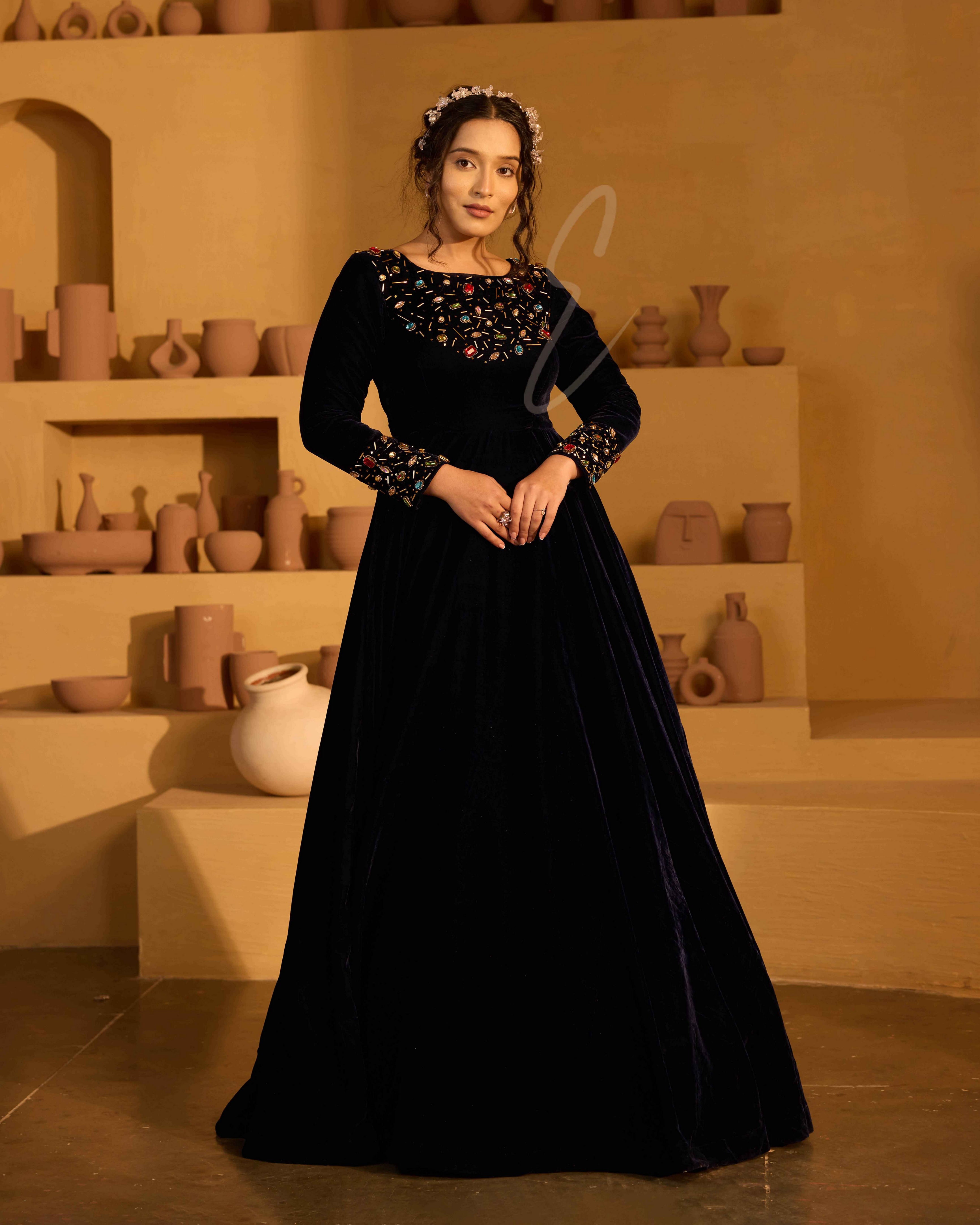 A navy blue velvet gown