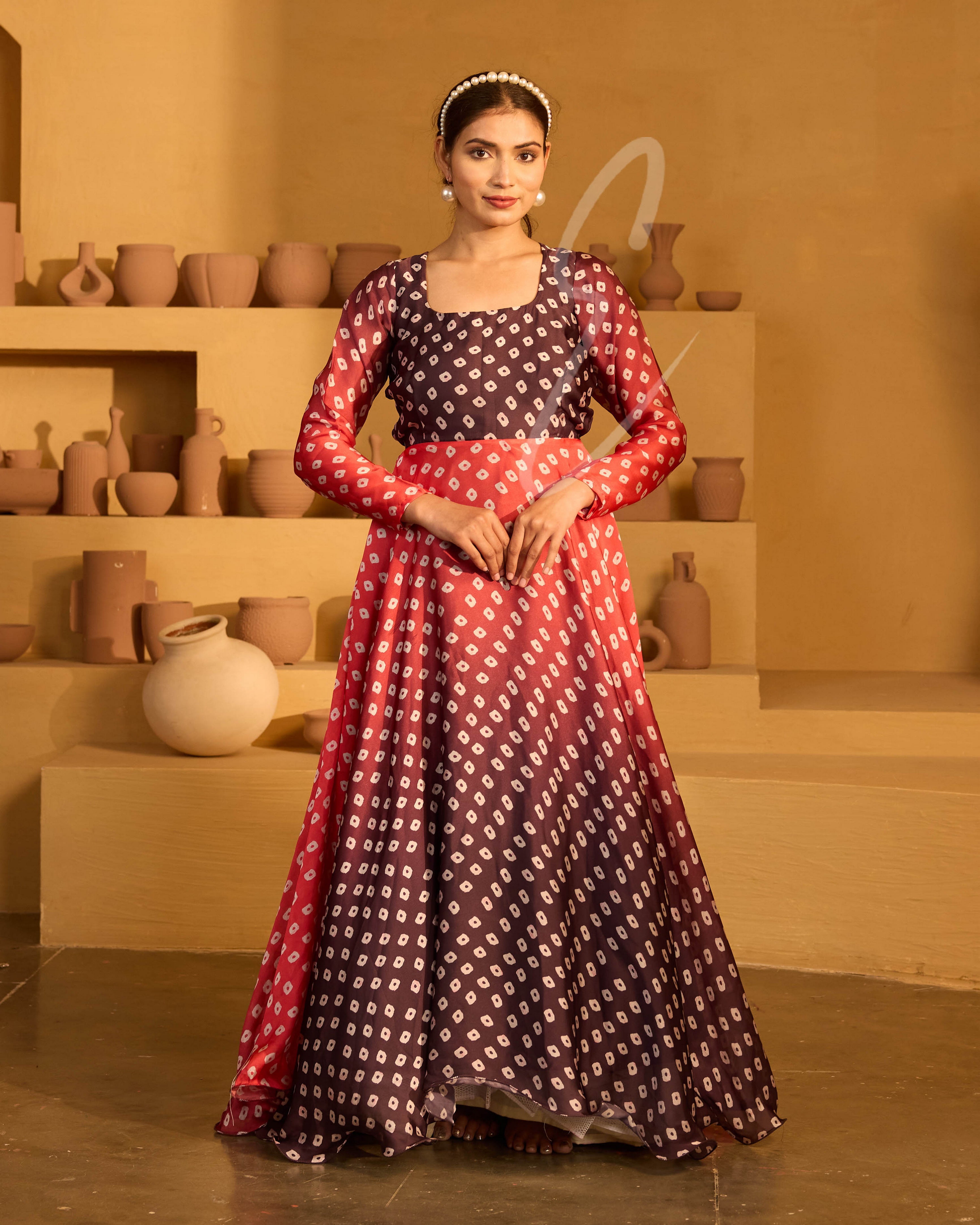 A red and dark brown satin georgette gown