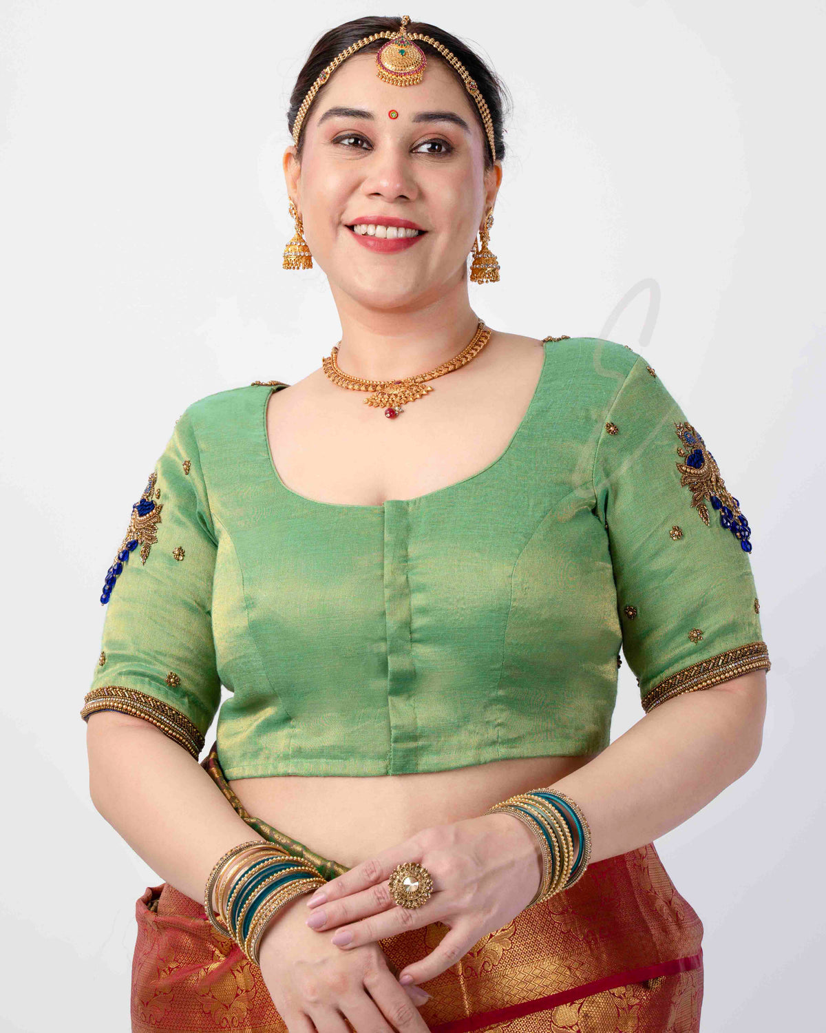 A parrot green tissue silk blouse