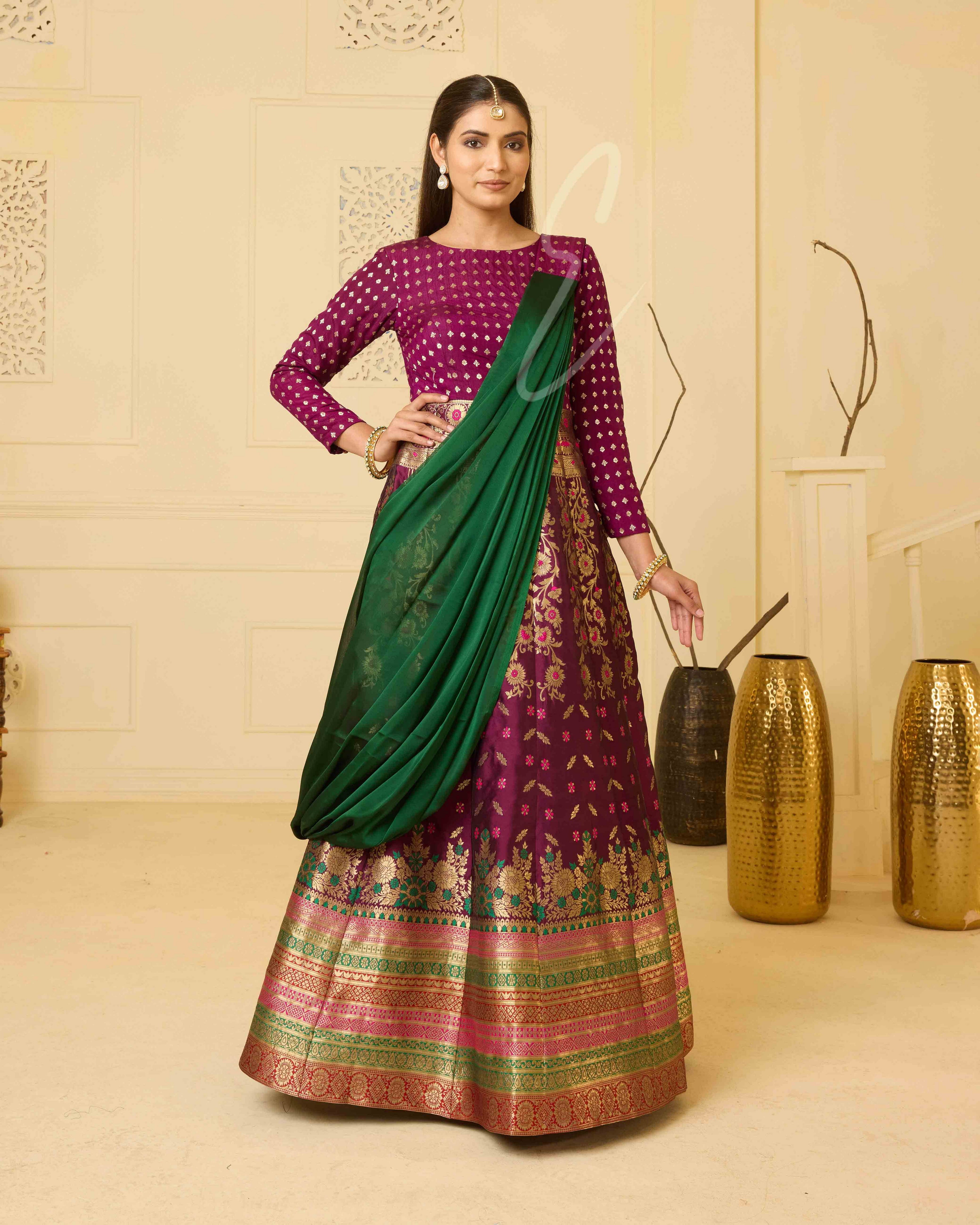 A wine Banarasi silk gown