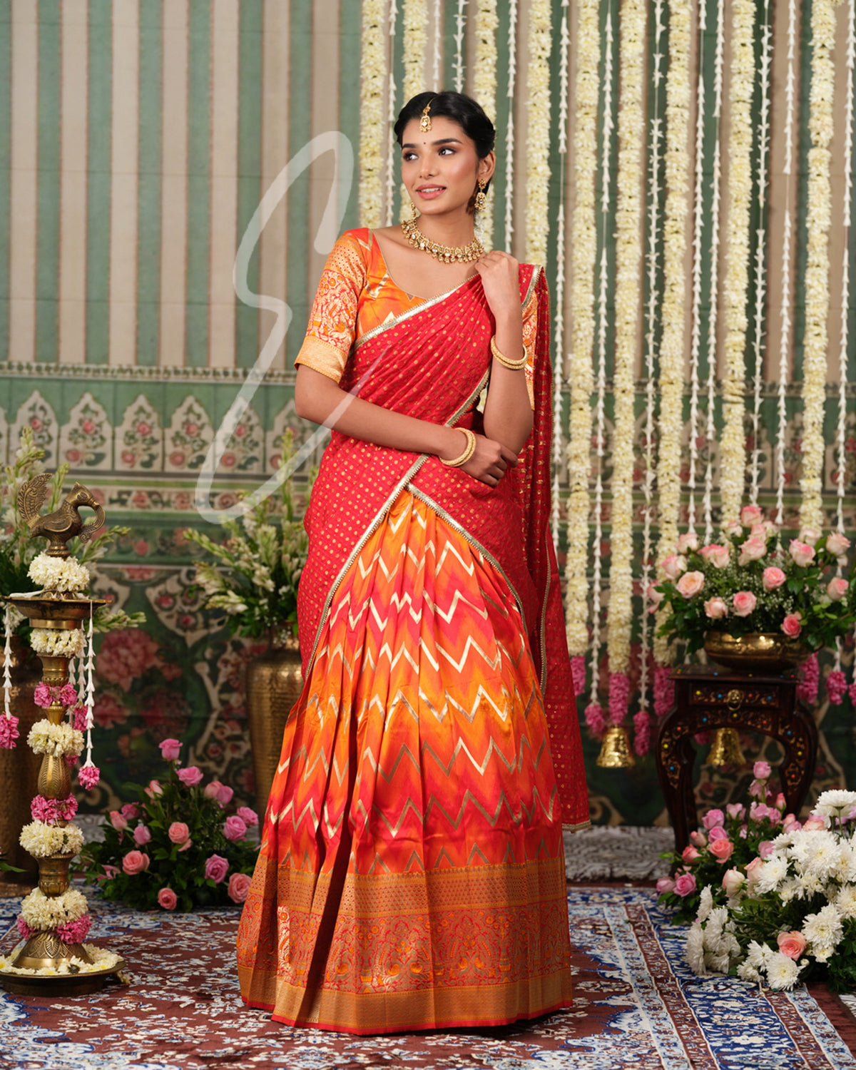 Red and orange Banarasi silk half saree with intricate woven detailing