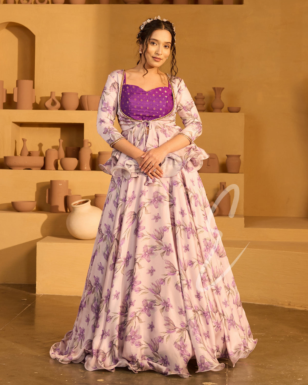 A lavender georgette satin skirt paired with a violet Banarasi silk blouse