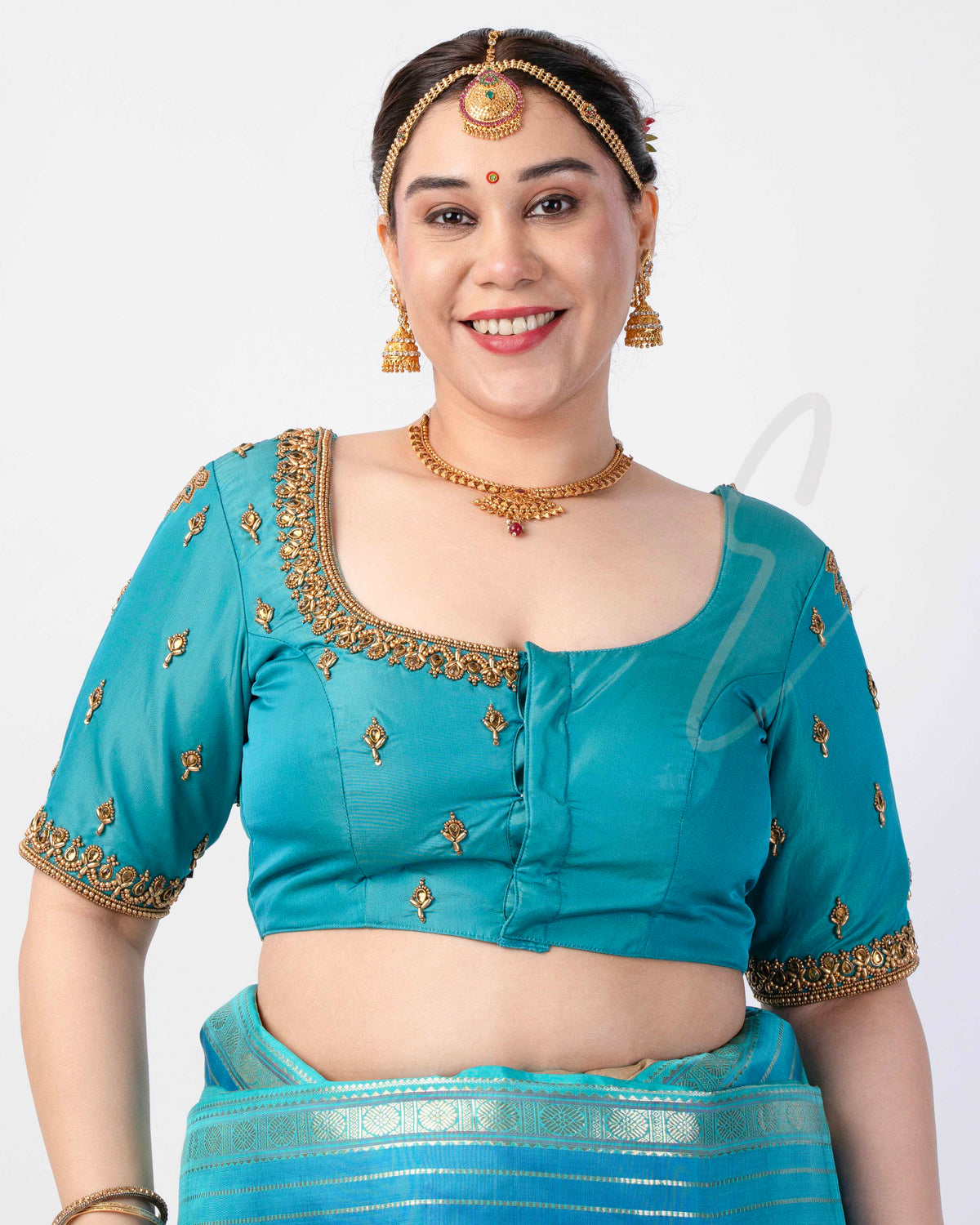 A Rama blue silk cotton blouse designed