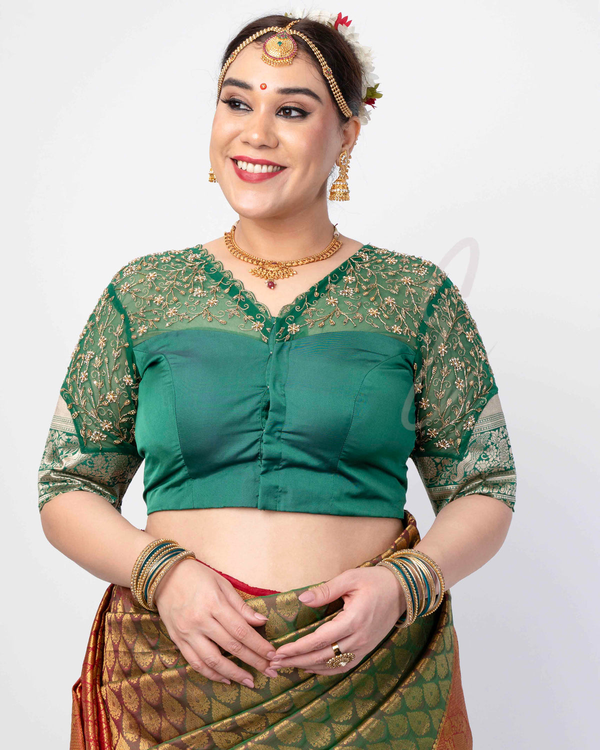 A green silk cotton with net blouse