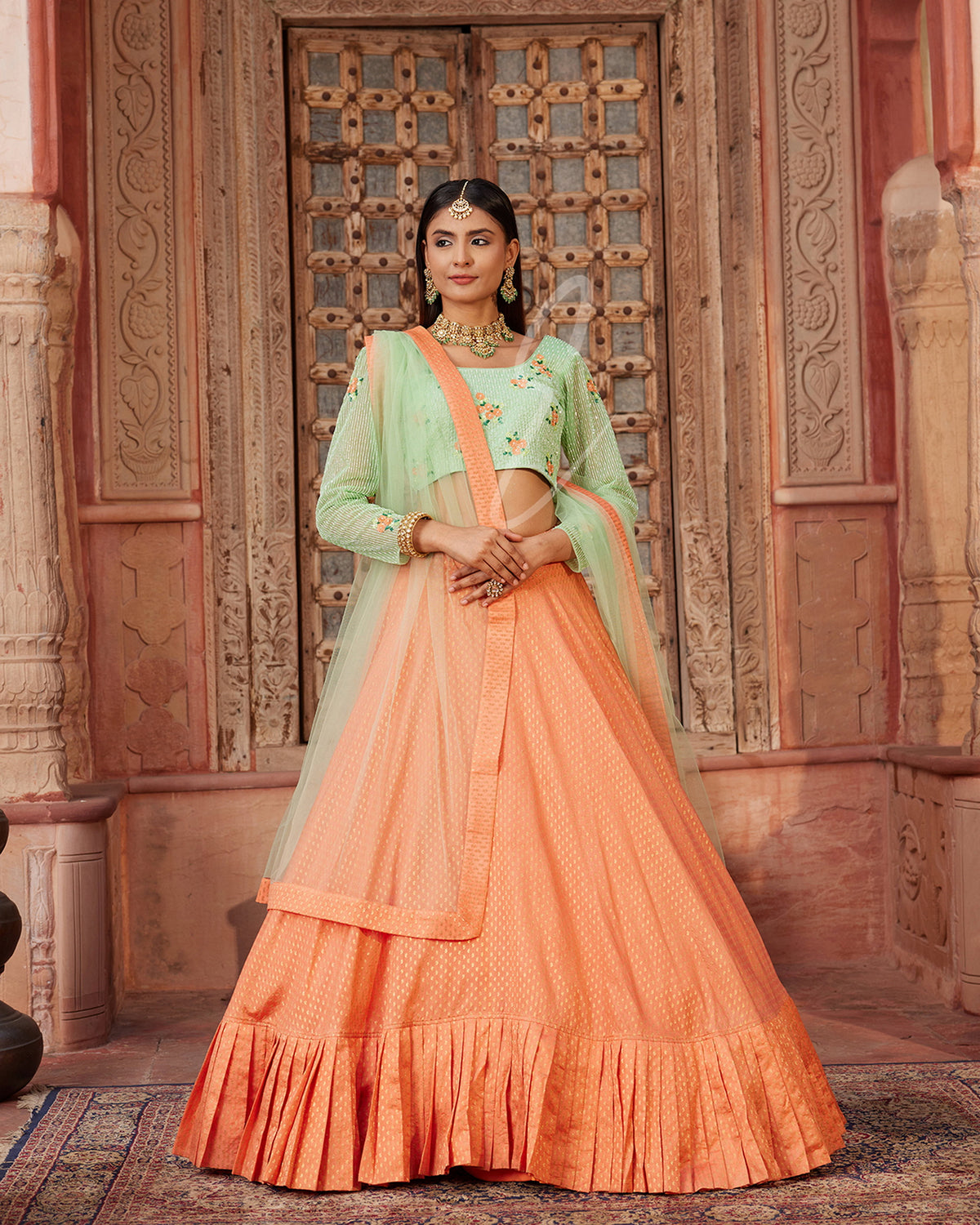 Peachy-orange Lehenga