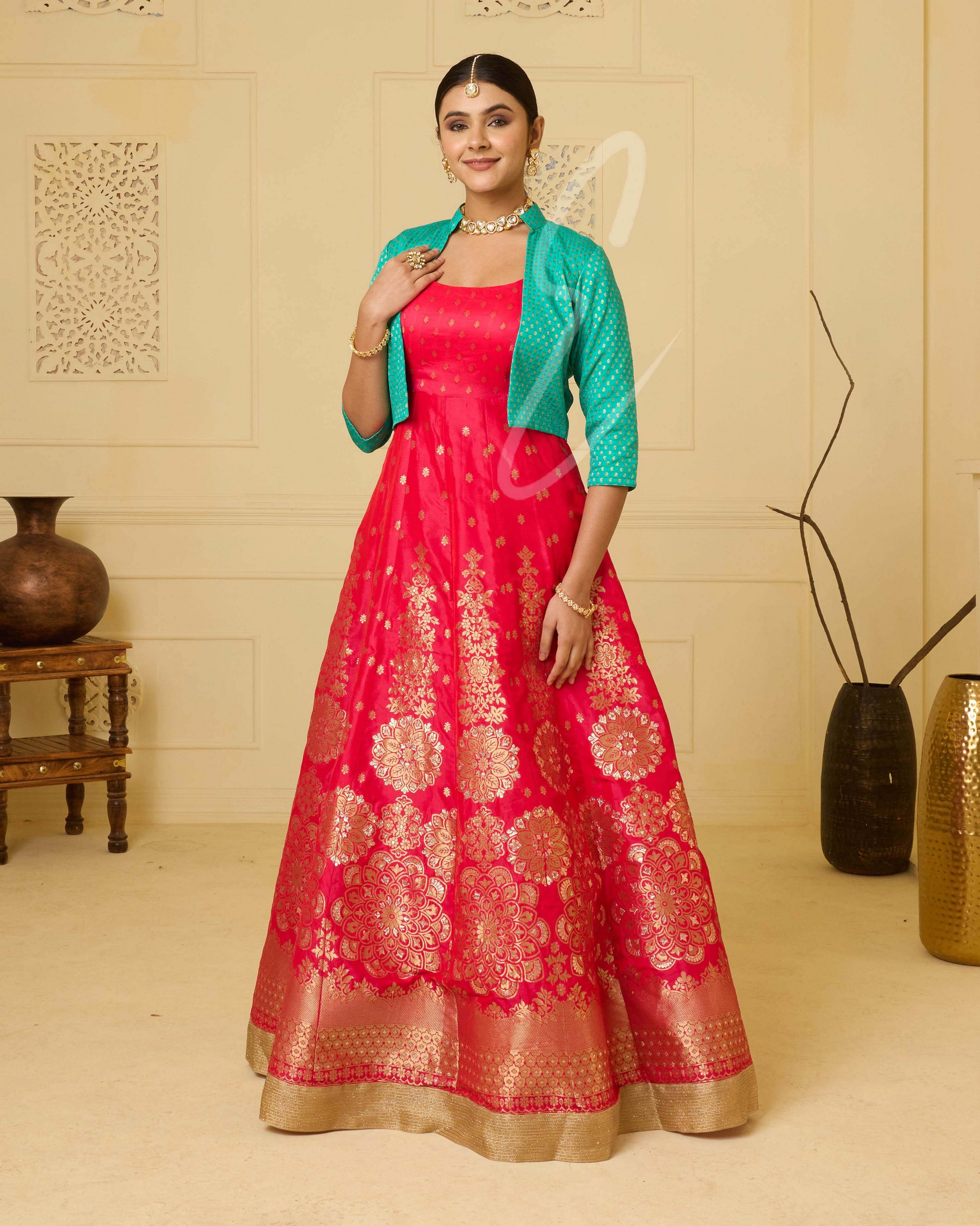 A deep pink Banarasi silk gown