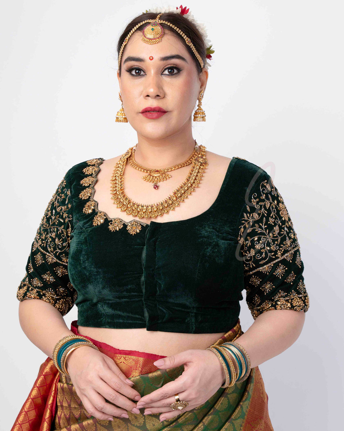 A dark green premium velvet blouse