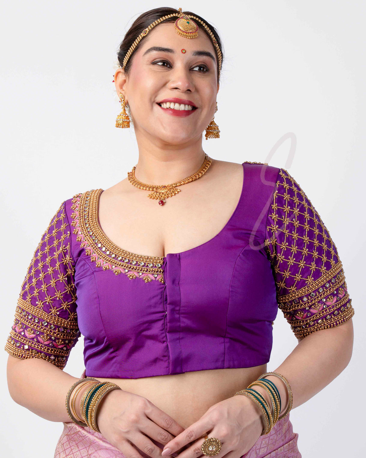 A purple silk cotton blouse