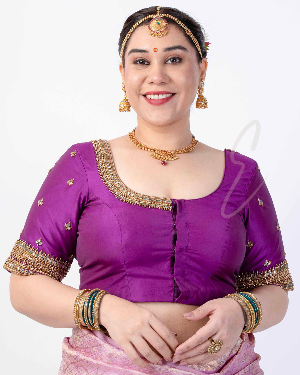 A purple silk cotton blouse designed