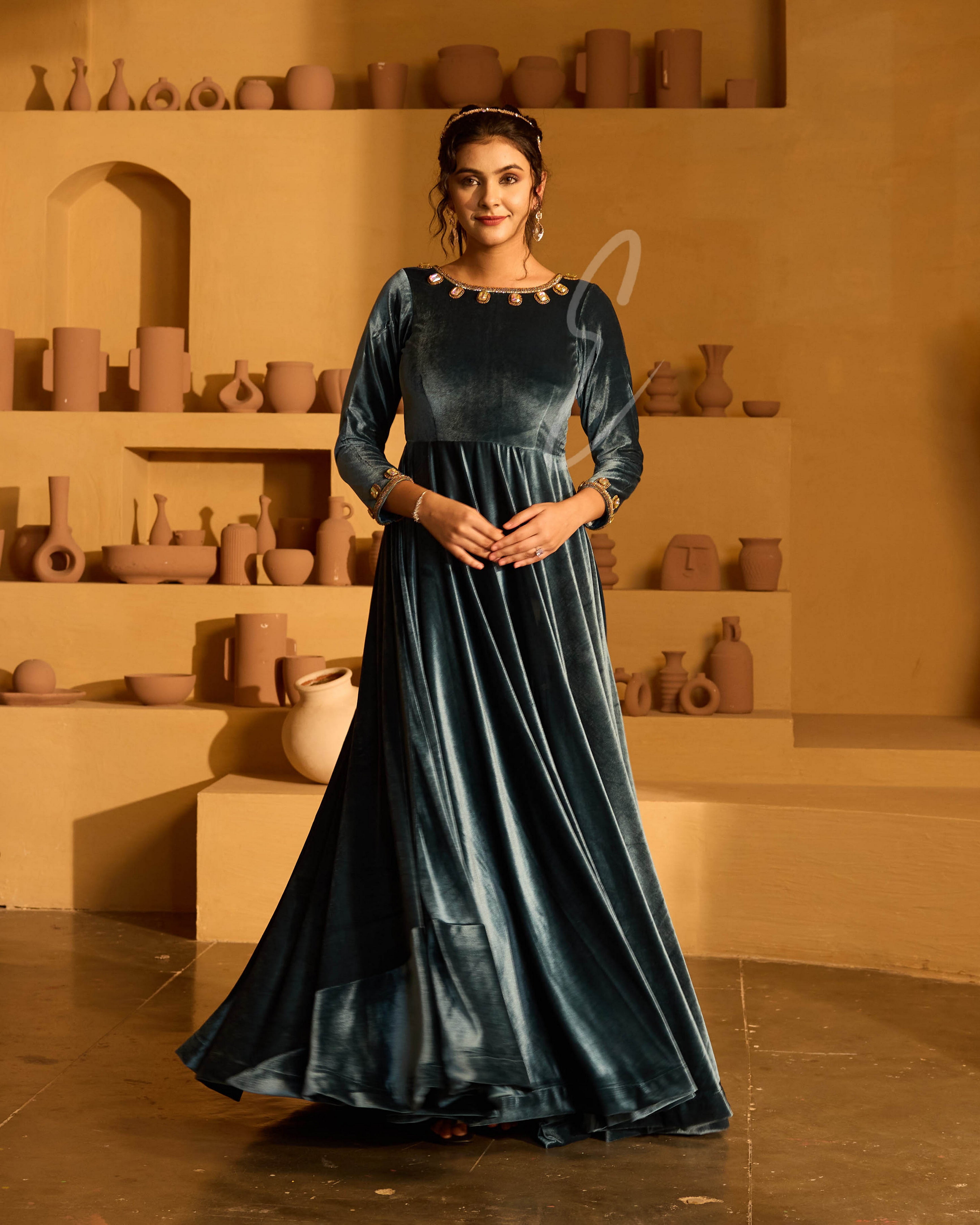 Designed in a deep peacock blue