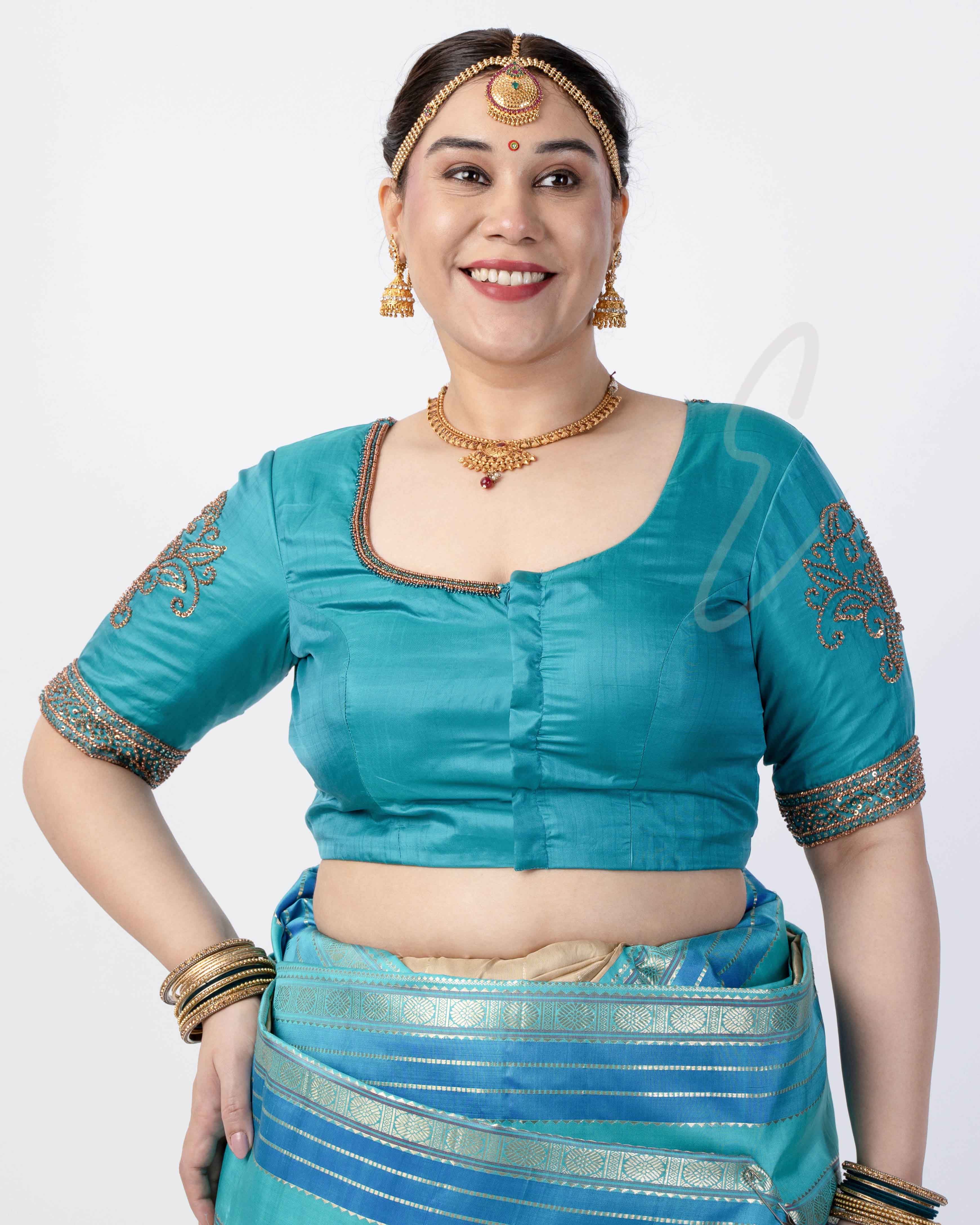 A blue silk cotton net blouse