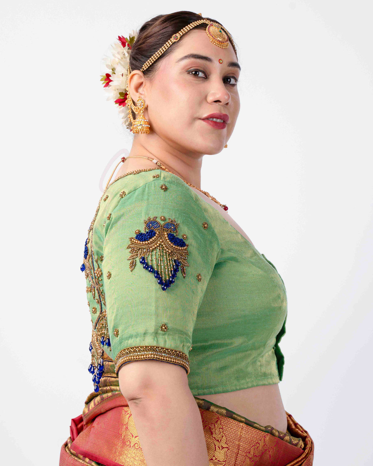 A parrot green tissue silk blouse