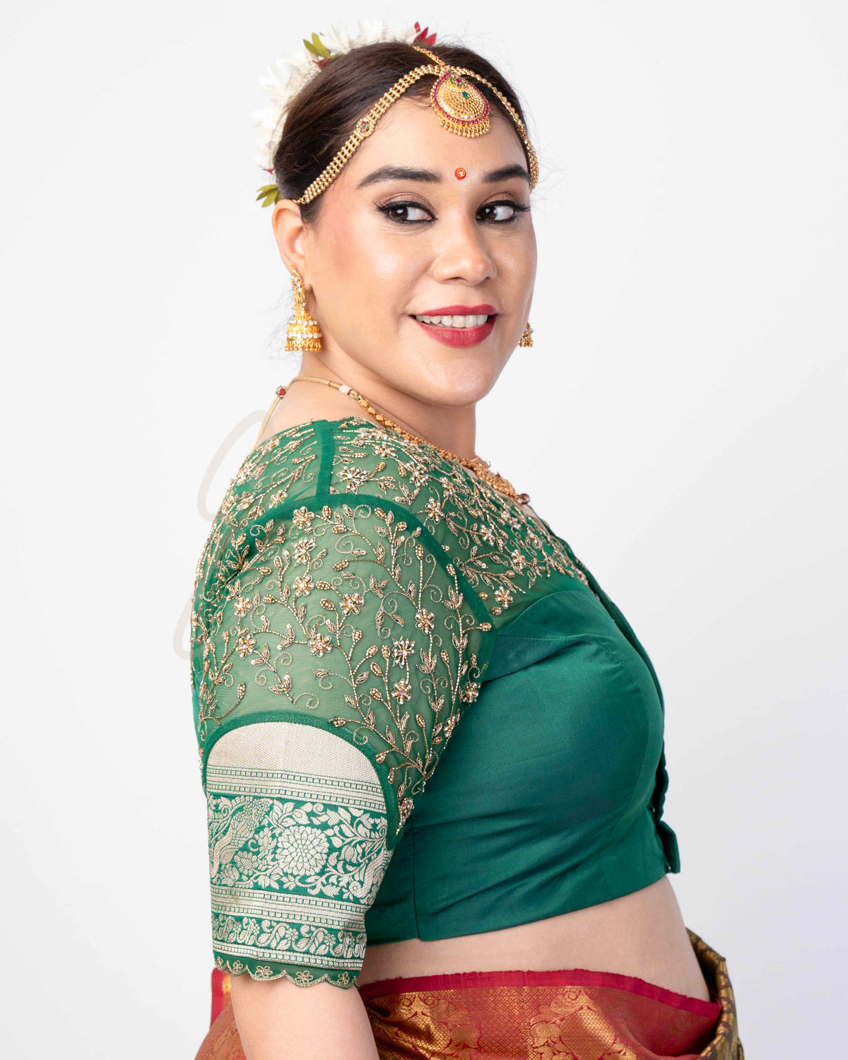 A green silk cotton with net blouse