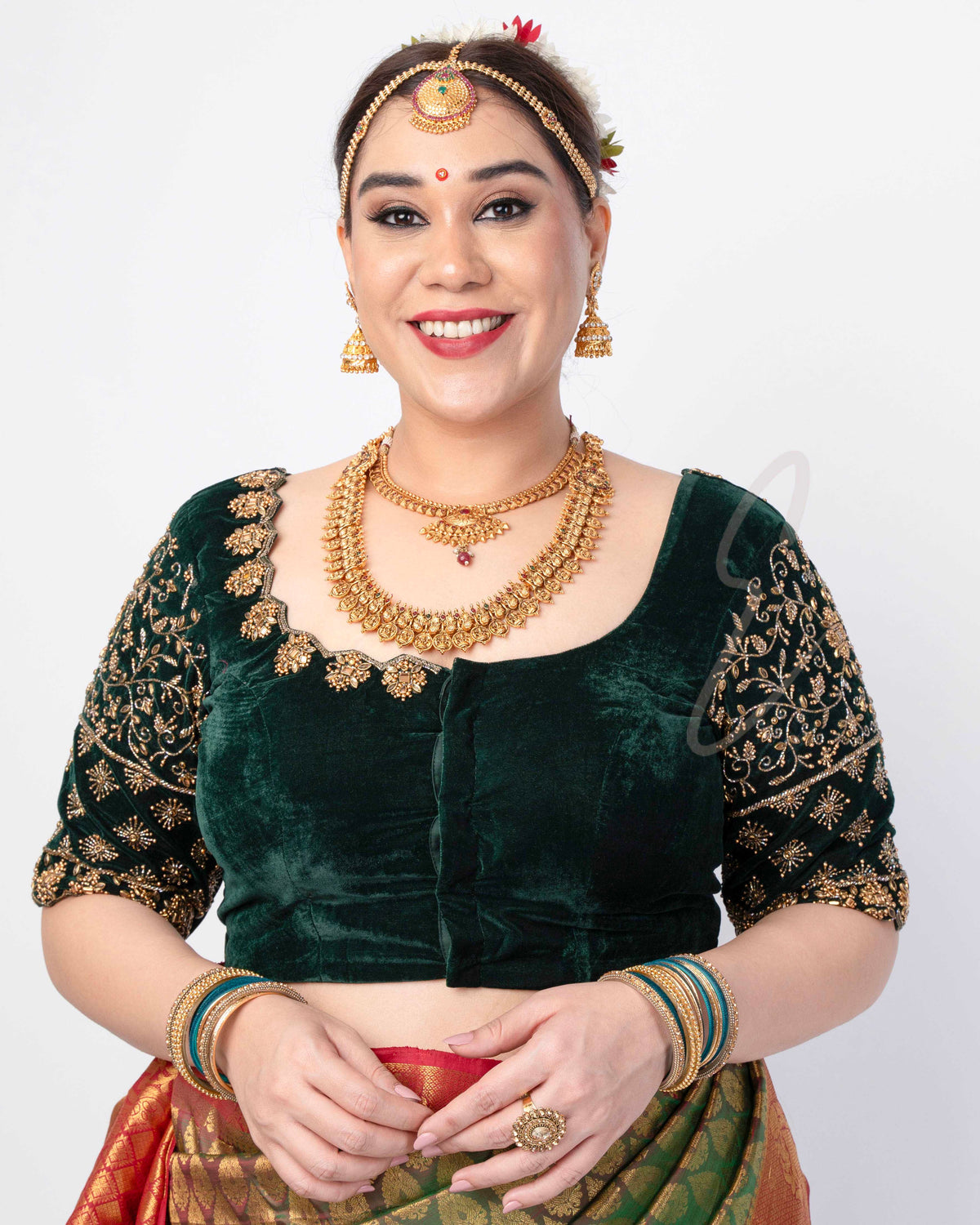 A dark green premium velvet blouse