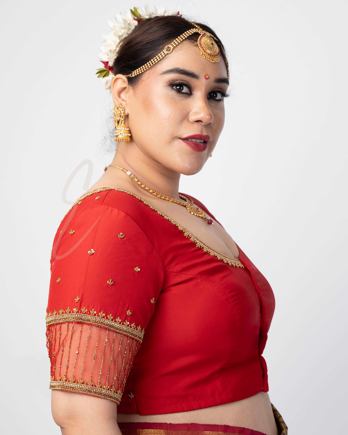 A red silk cotton net blouse designed