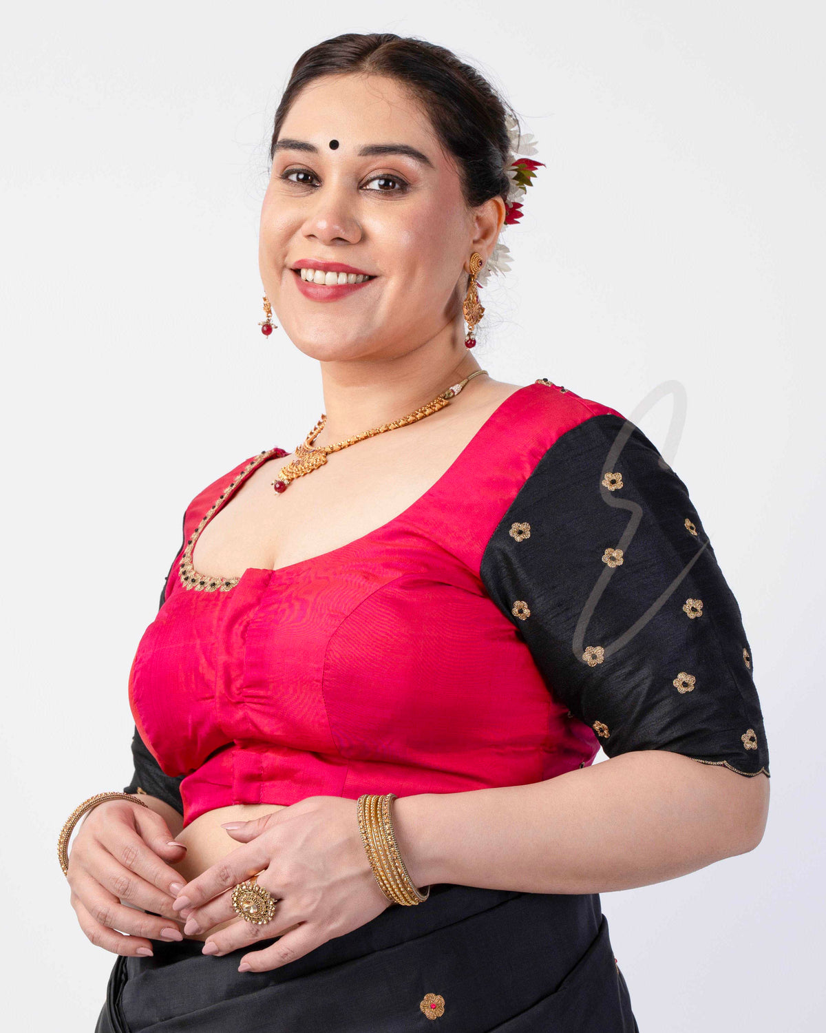 A pink and black raw silk blouse designed in a princess-cut style EB0002