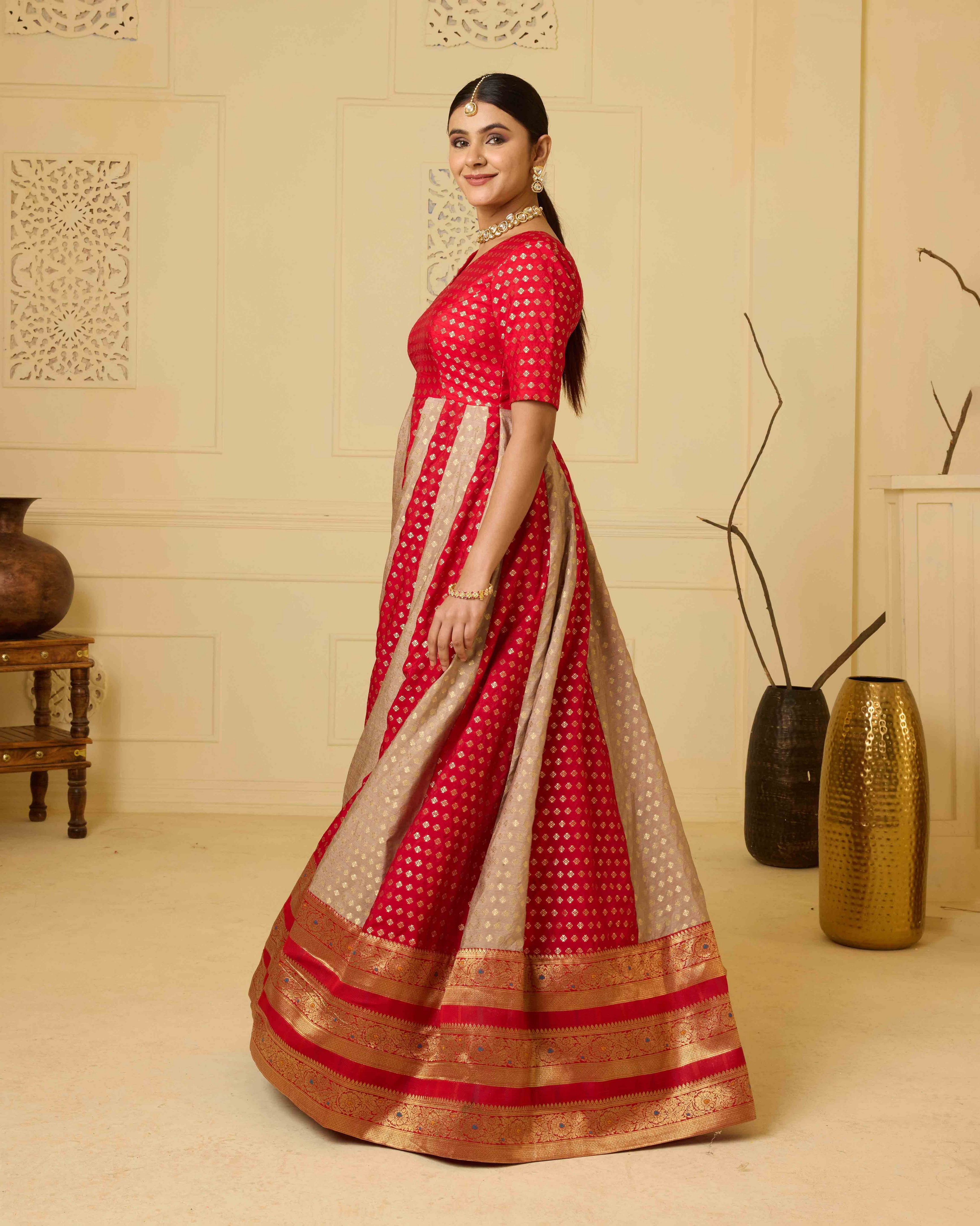 A striking red Banarasi silk gown