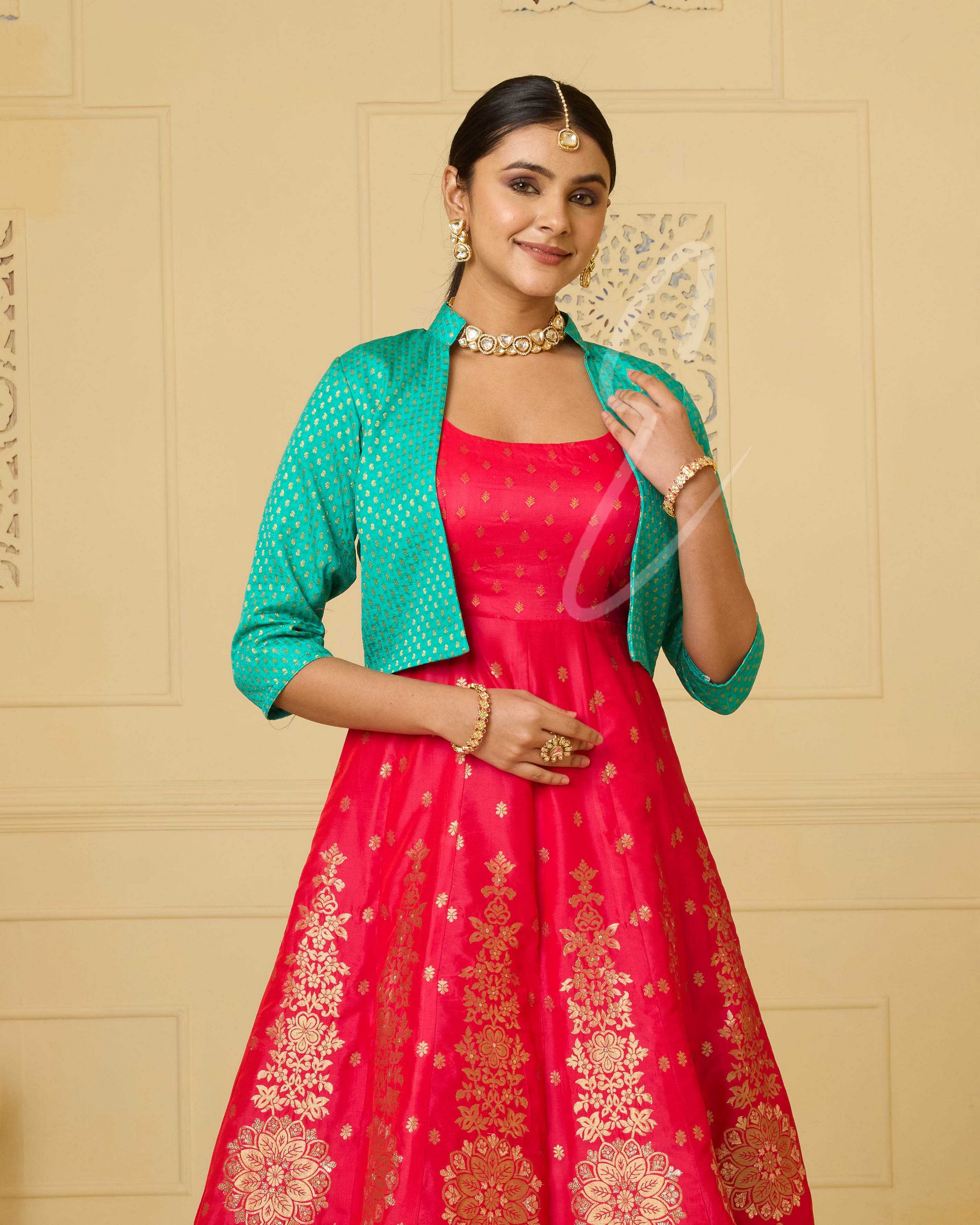 A deep pink Banarasi silk gown
