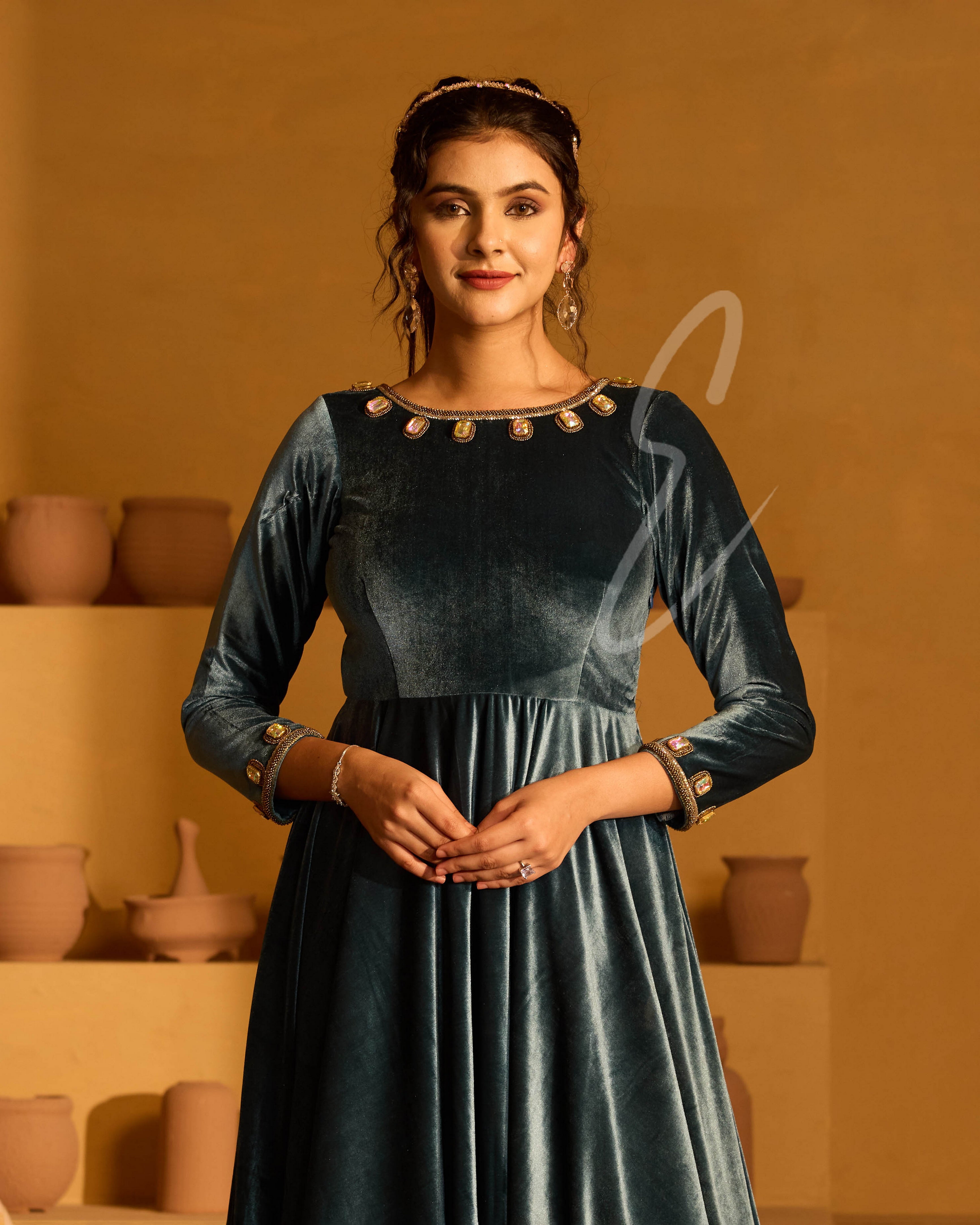 Designed in a deep peacock blue