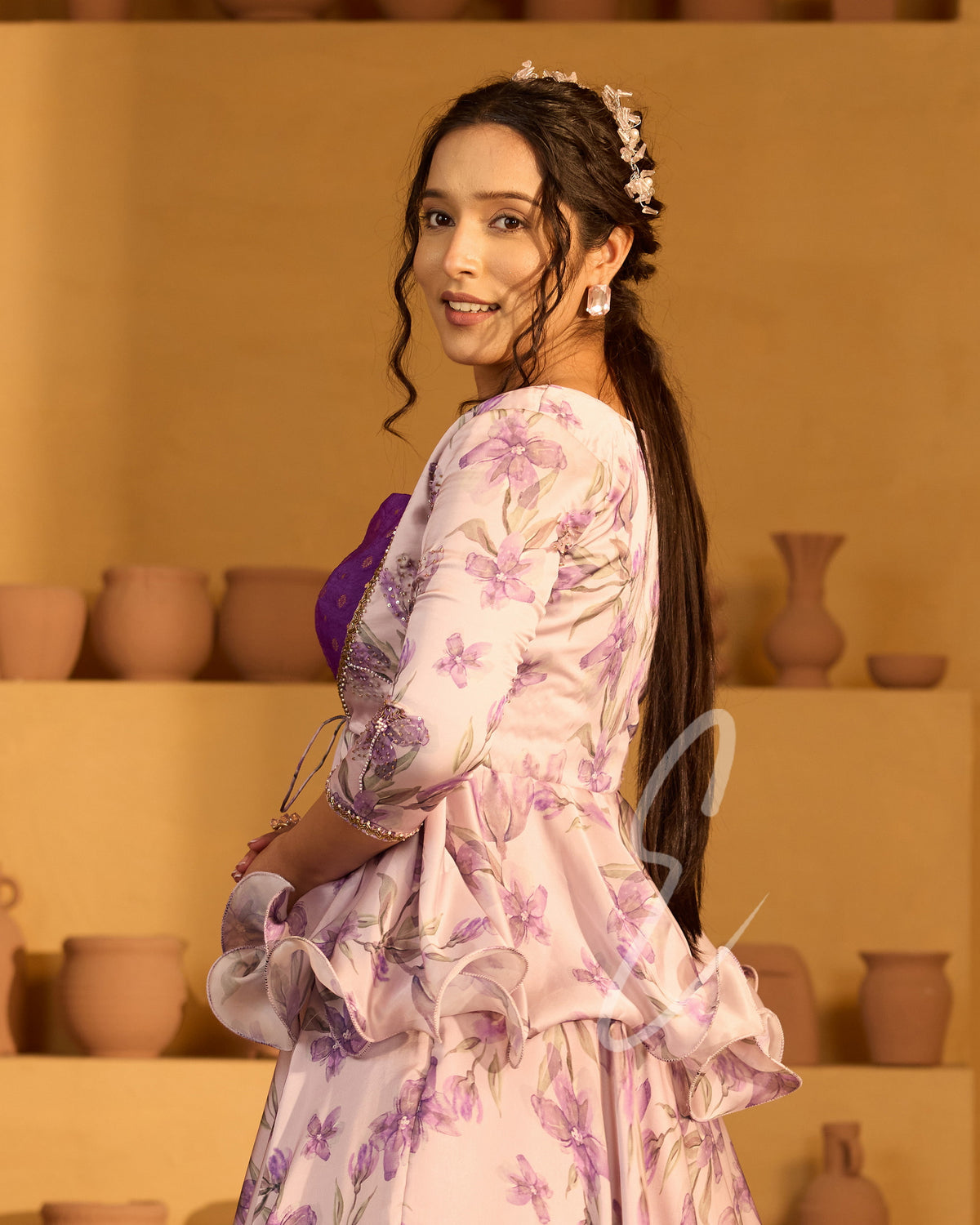 A lavender georgette satin skirt paired with a violet Banarasi silk blouse