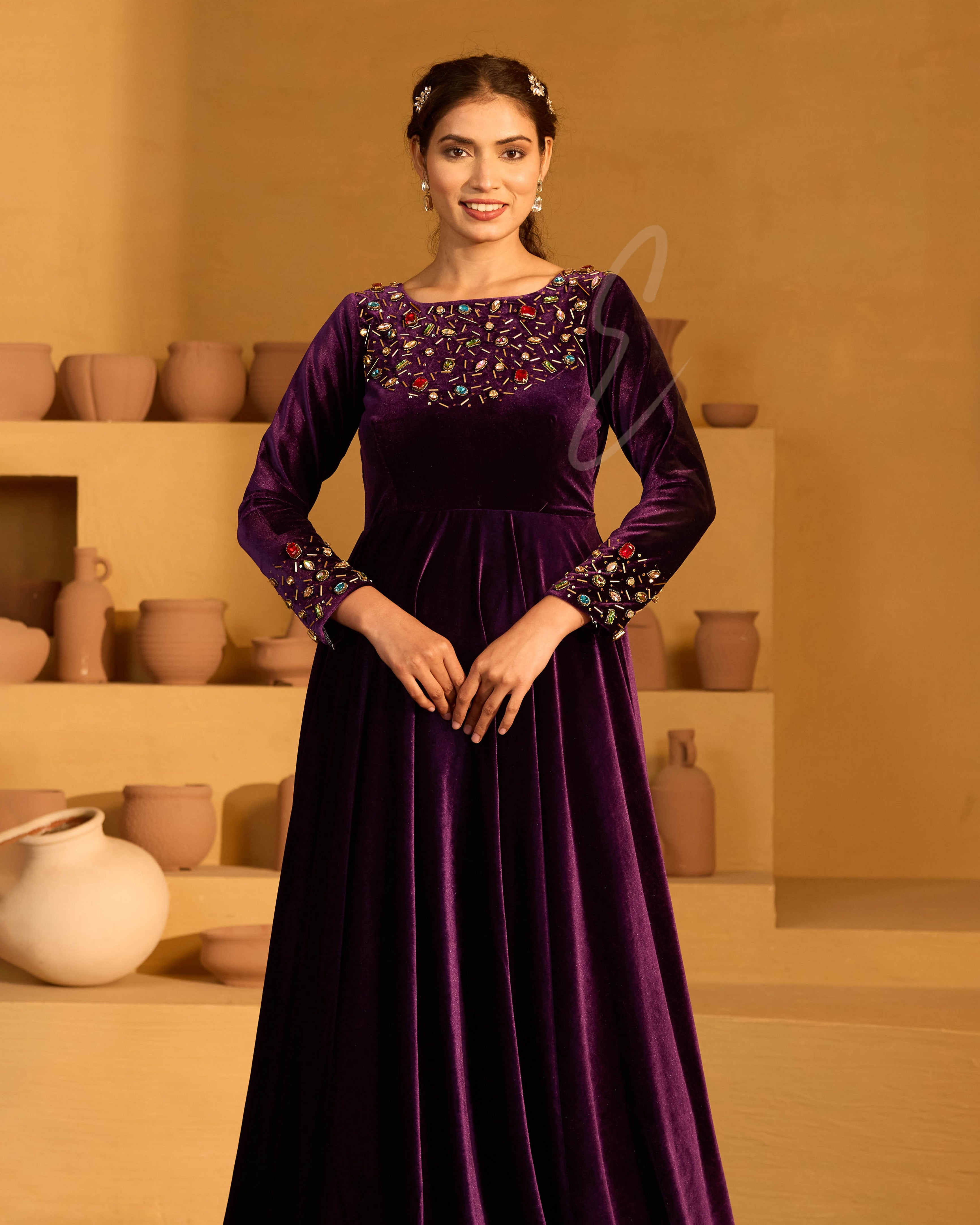 A deep violet velvet gown
