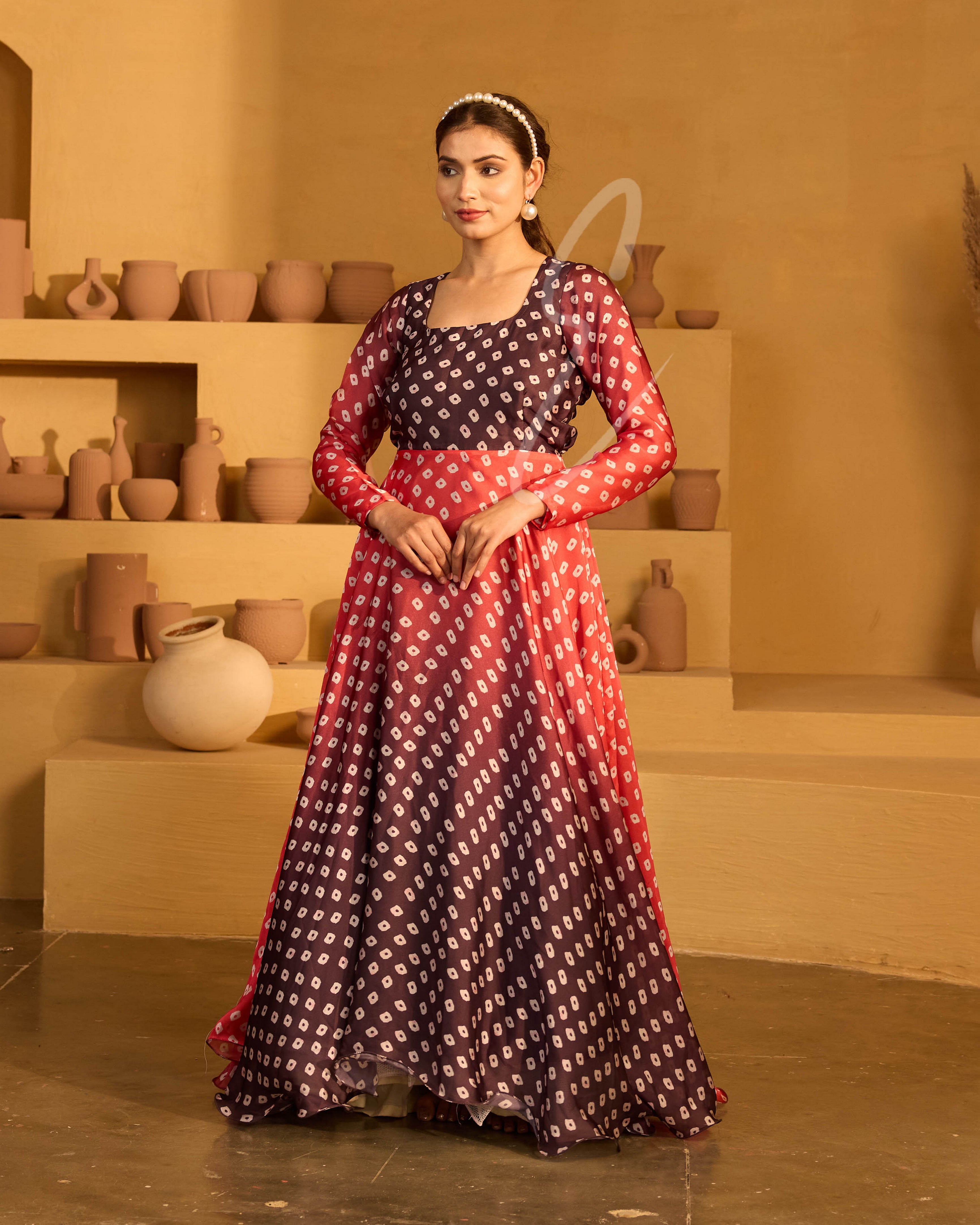 A red and dark brown satin georgette gown