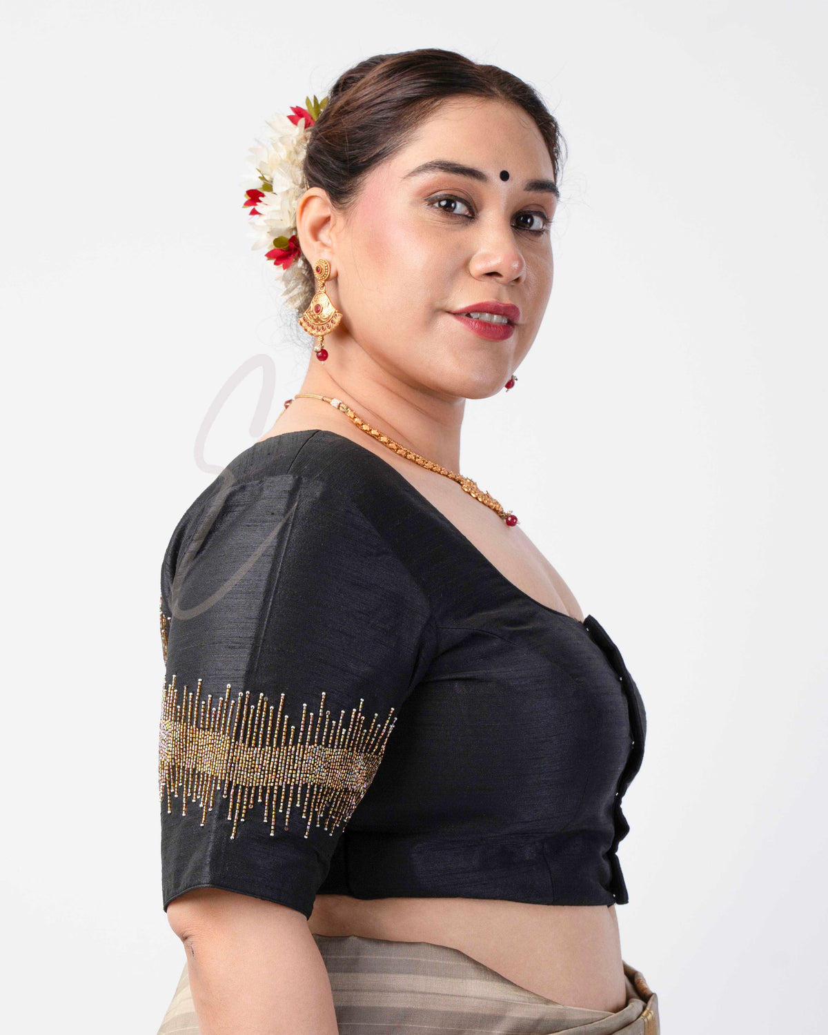 black raw silk blouse designed in a princess-cut style