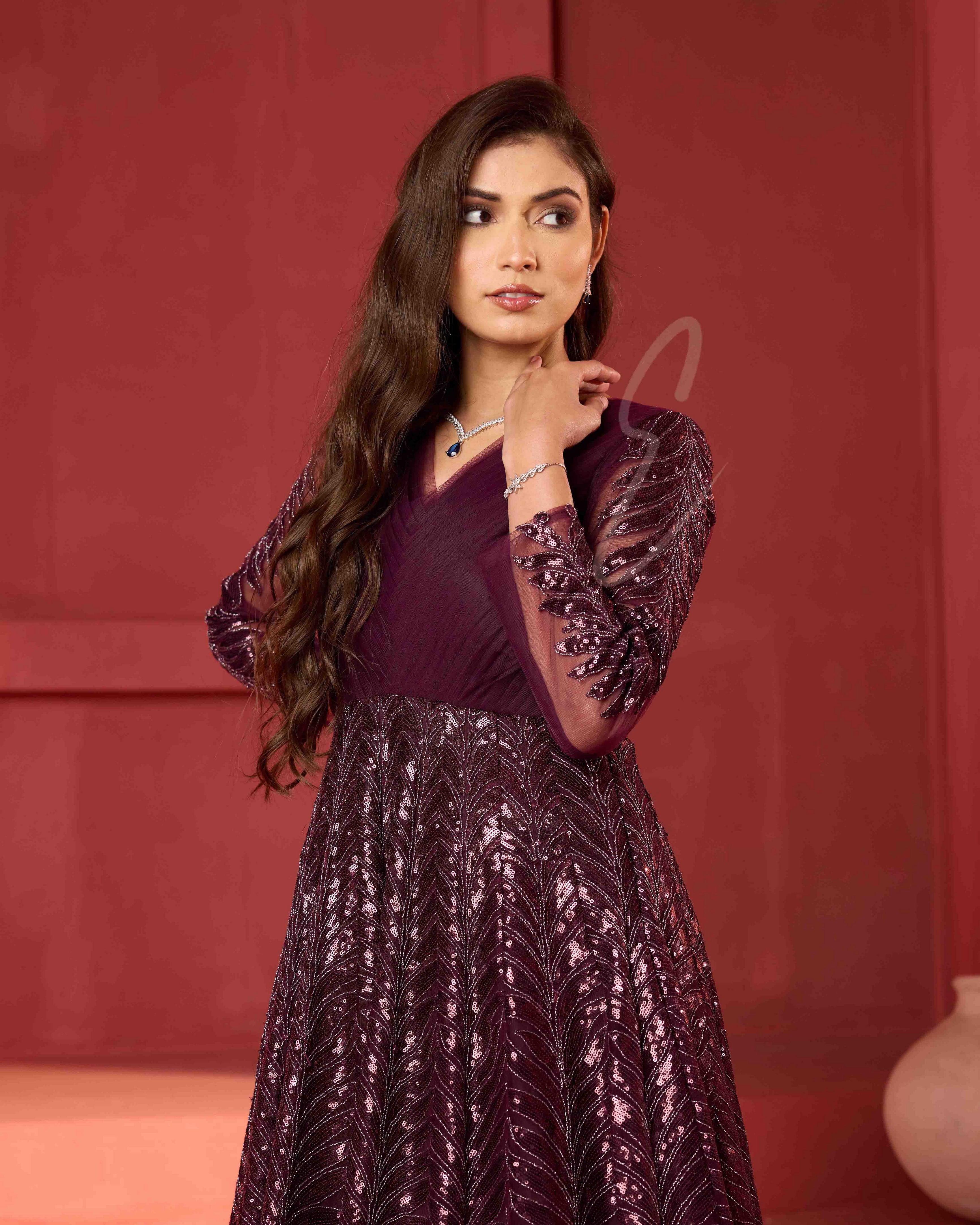 A wine-coloured premium net gown
