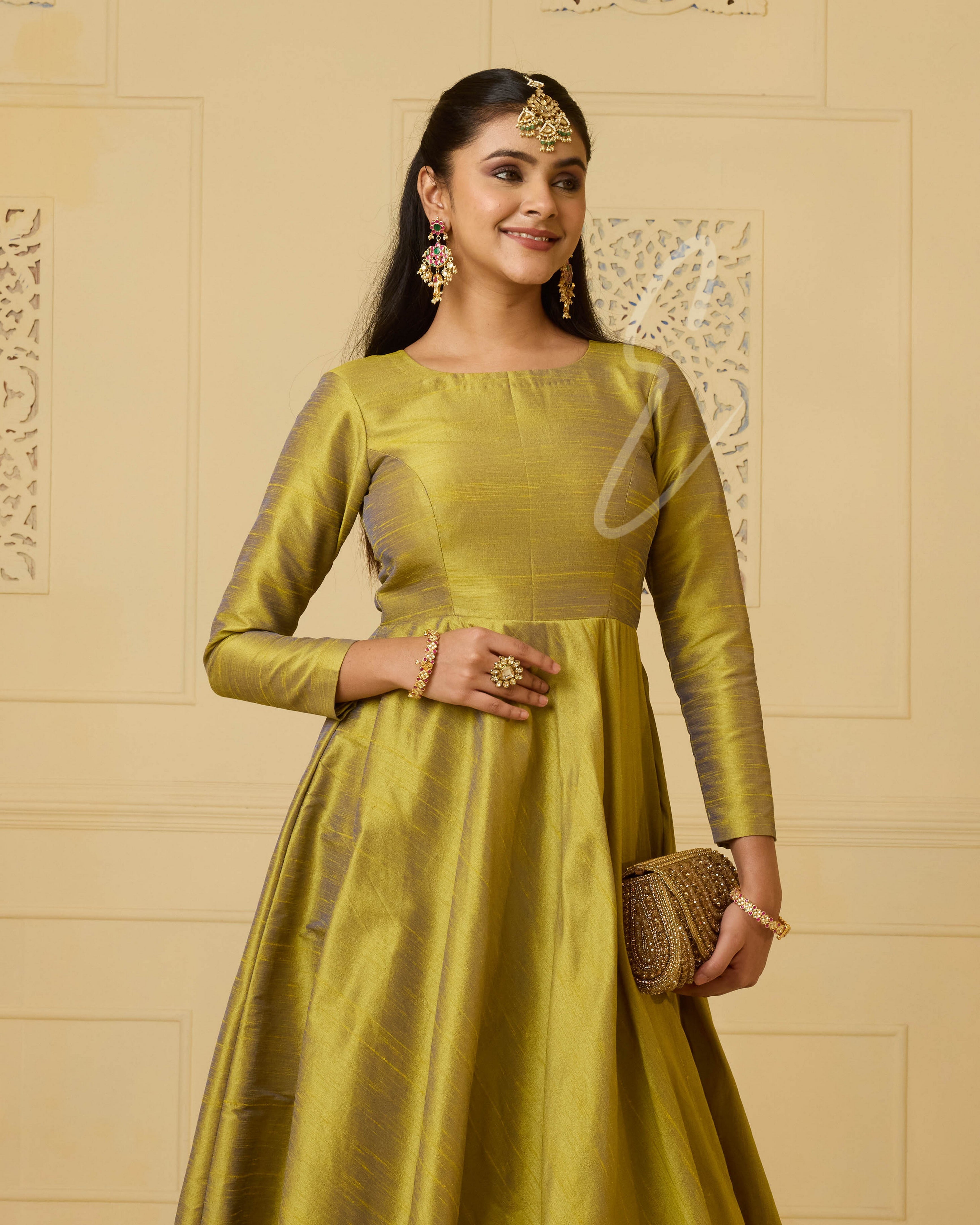 A premium raw silk gown in green