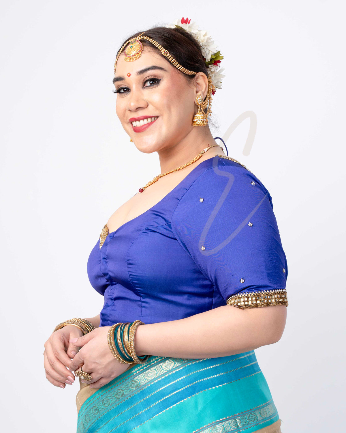 blue silk cotton blouse designed in a princess style