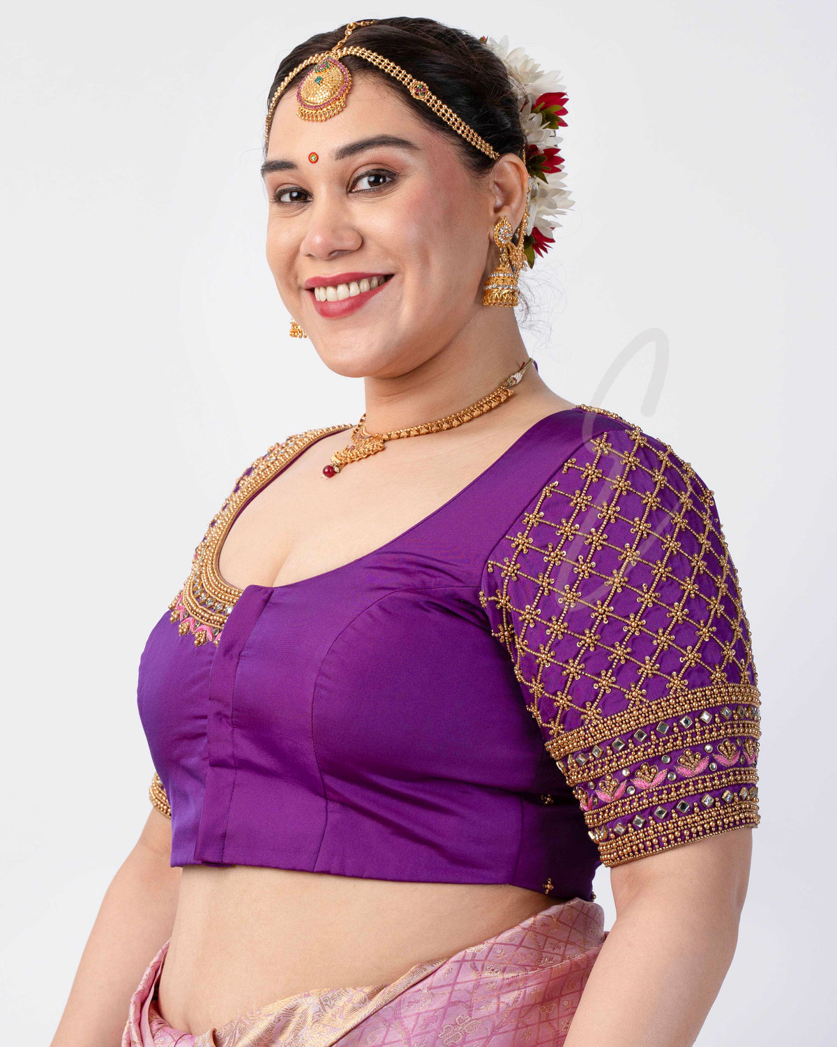 A purple silk cotton blouse