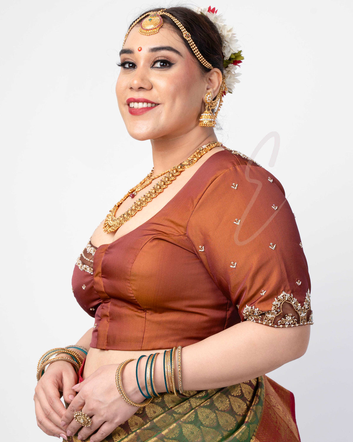 A brown silk cotton with net blouse