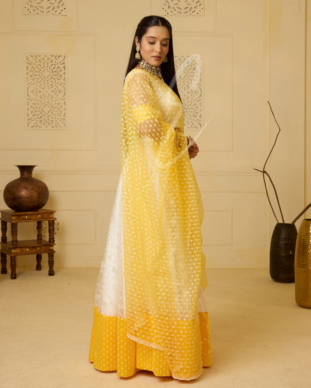 An elegant white and yellow lehenga