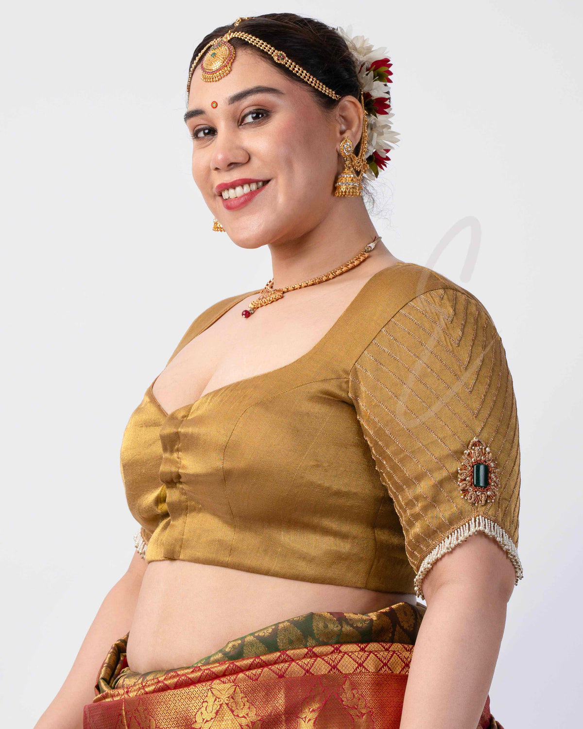 A gold tissue silk blouse
