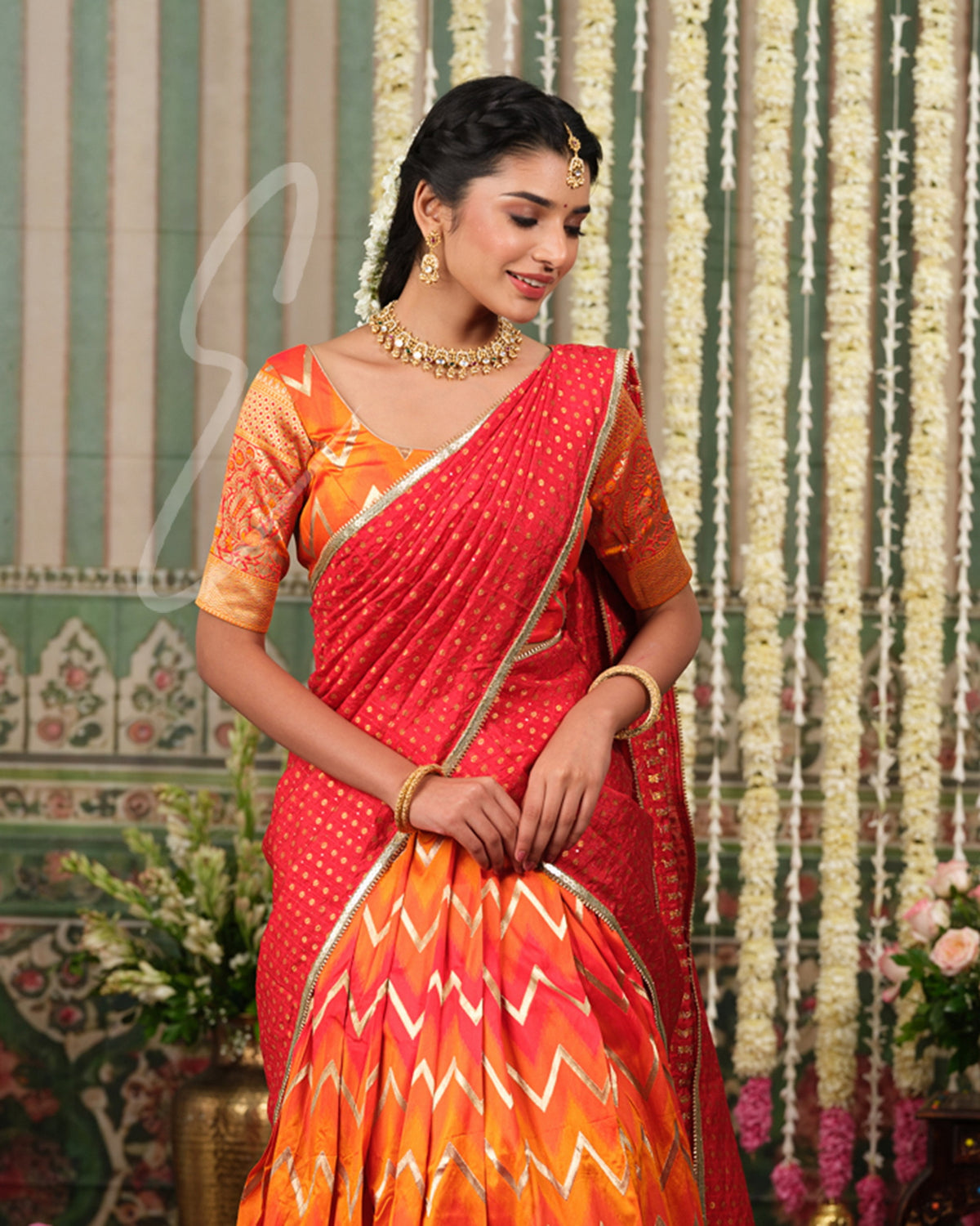Red and orange Banarasi silk half saree with intricate woven detailing
