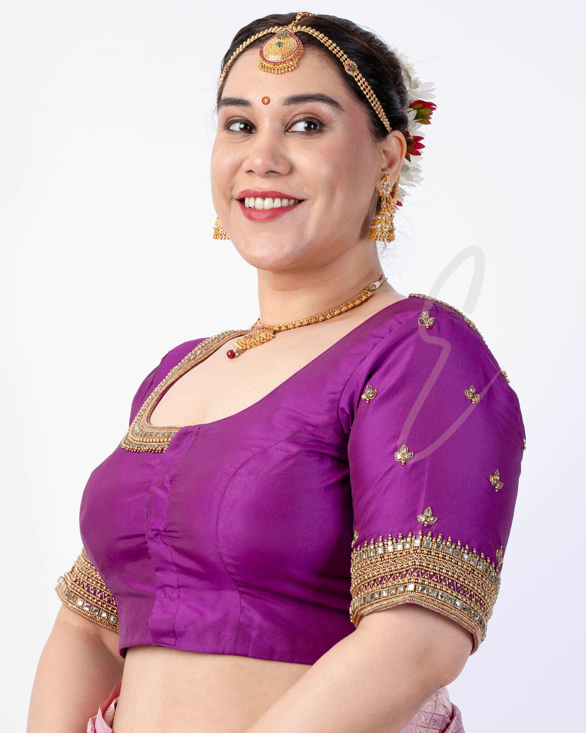 A purple silk cotton blouse designed