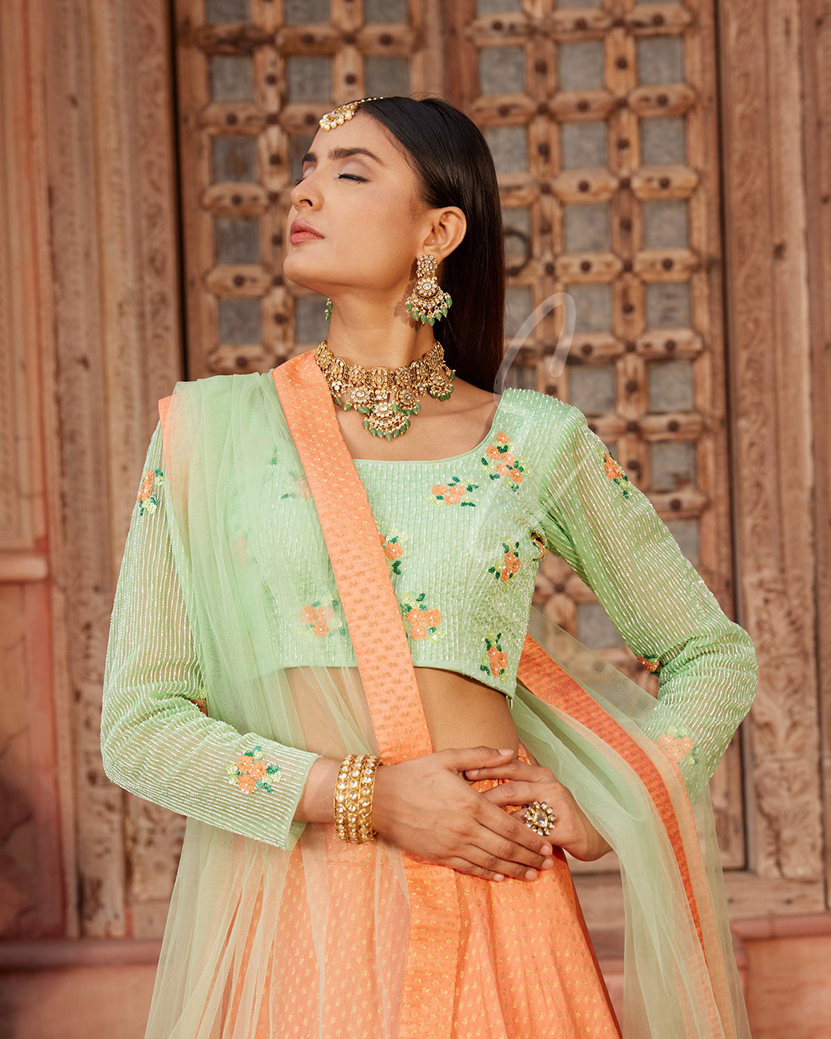 Peachy-orange Lehenga