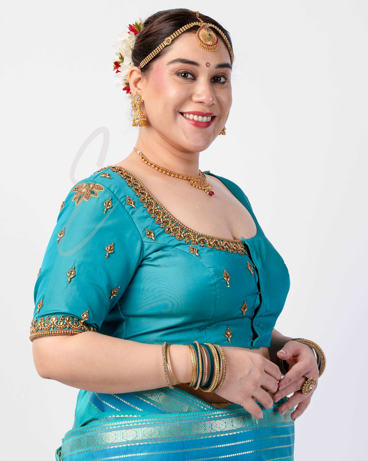 A Rama blue silk cotton blouse designed