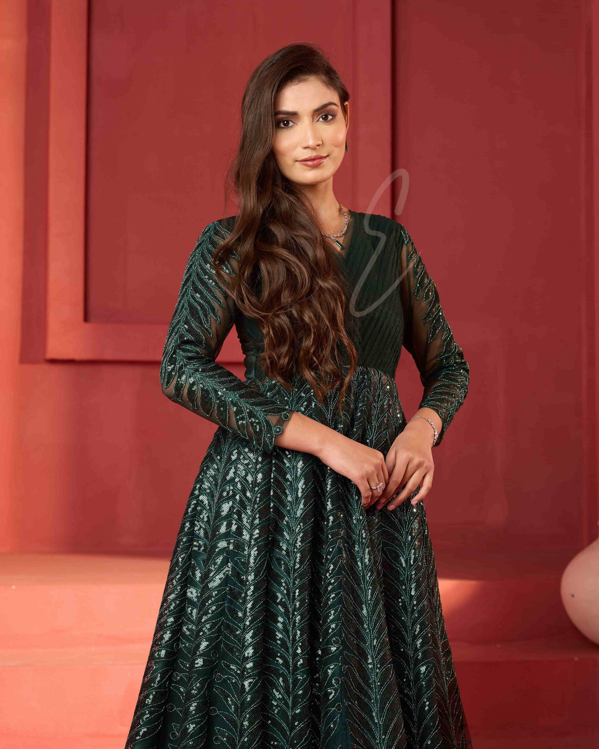 A dark green premium net gown