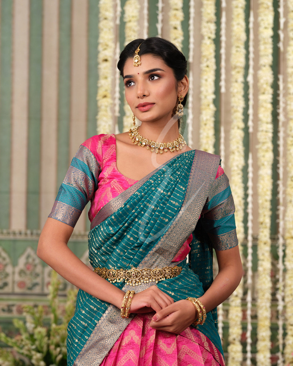 A beautiful pink and rama green silk cotton outfit that looks rich and elegant