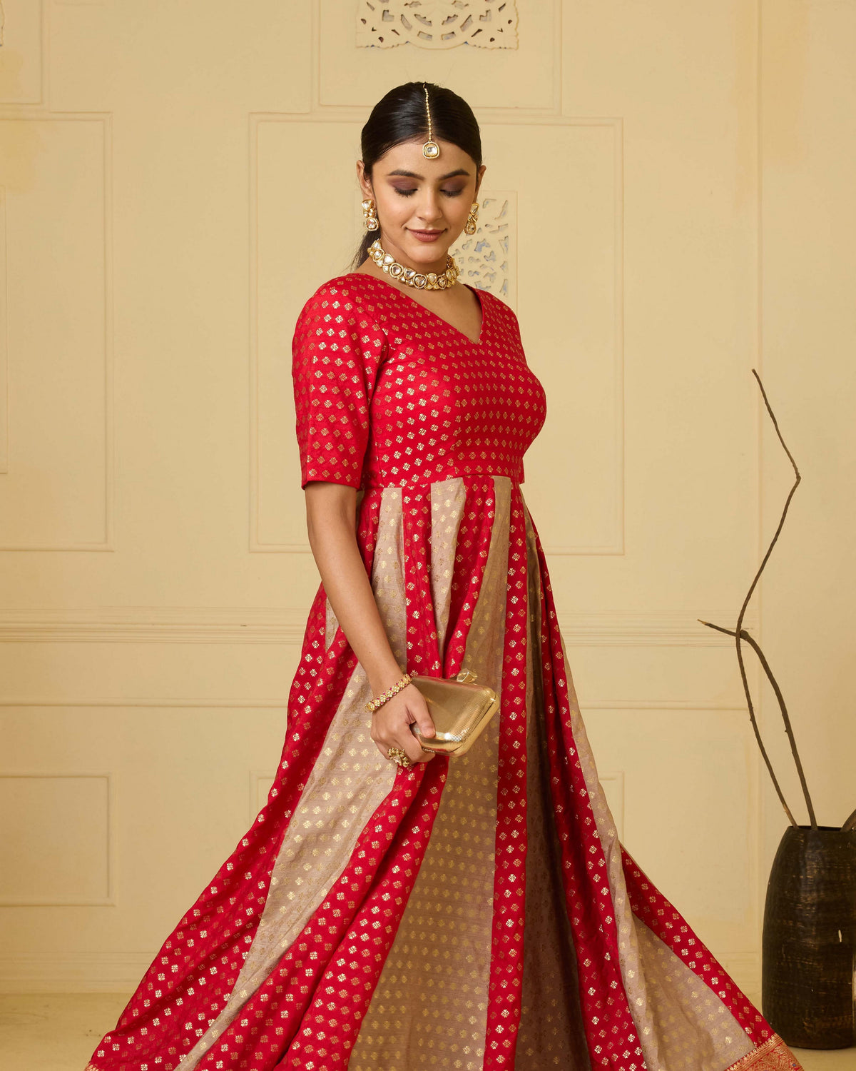 A striking red Banarasi silk gown