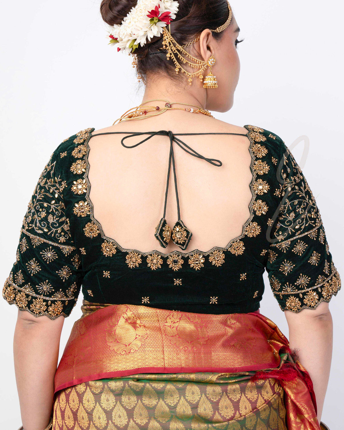 A dark green premium velvet blouse