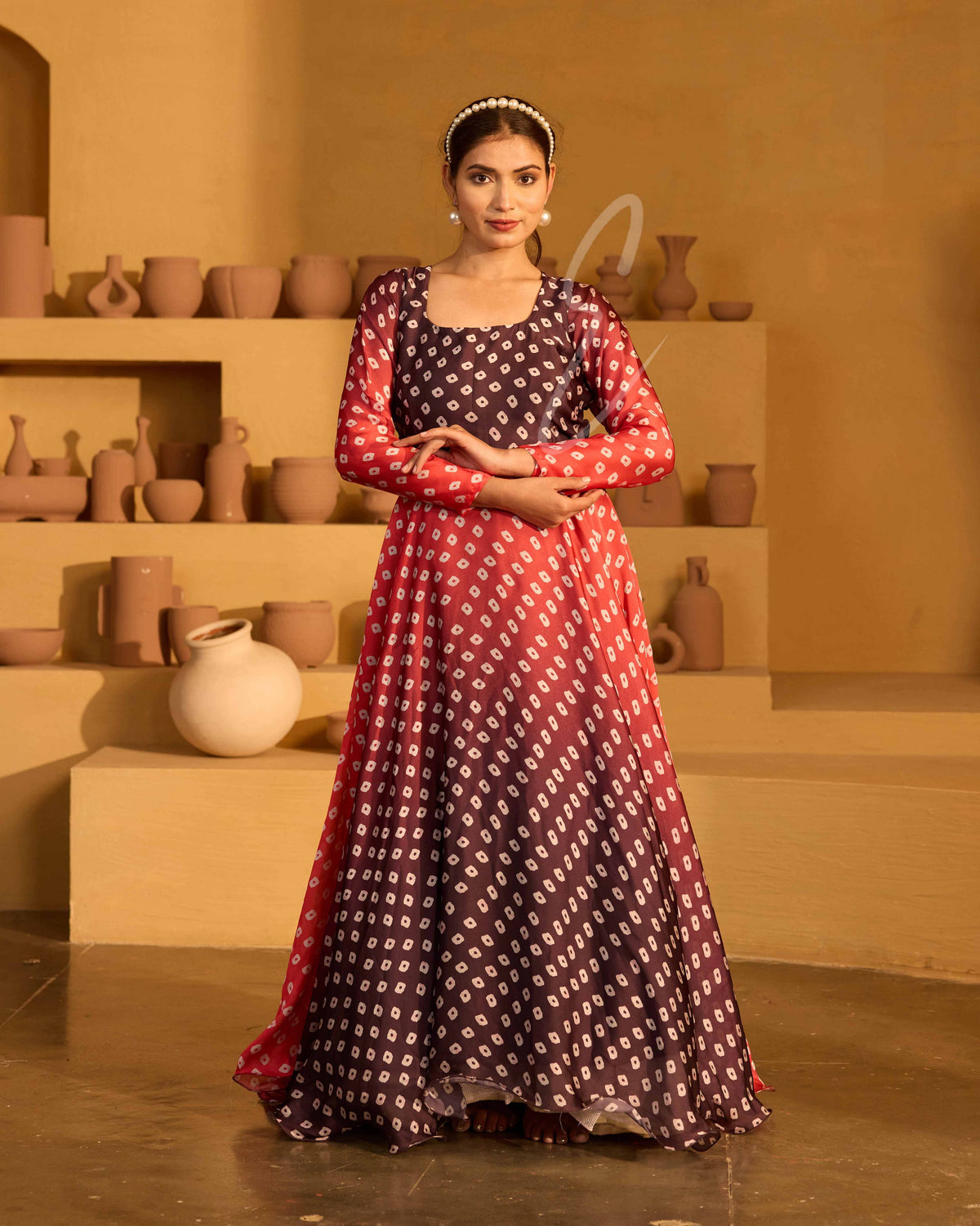 A red and dark brown satin georgette gown