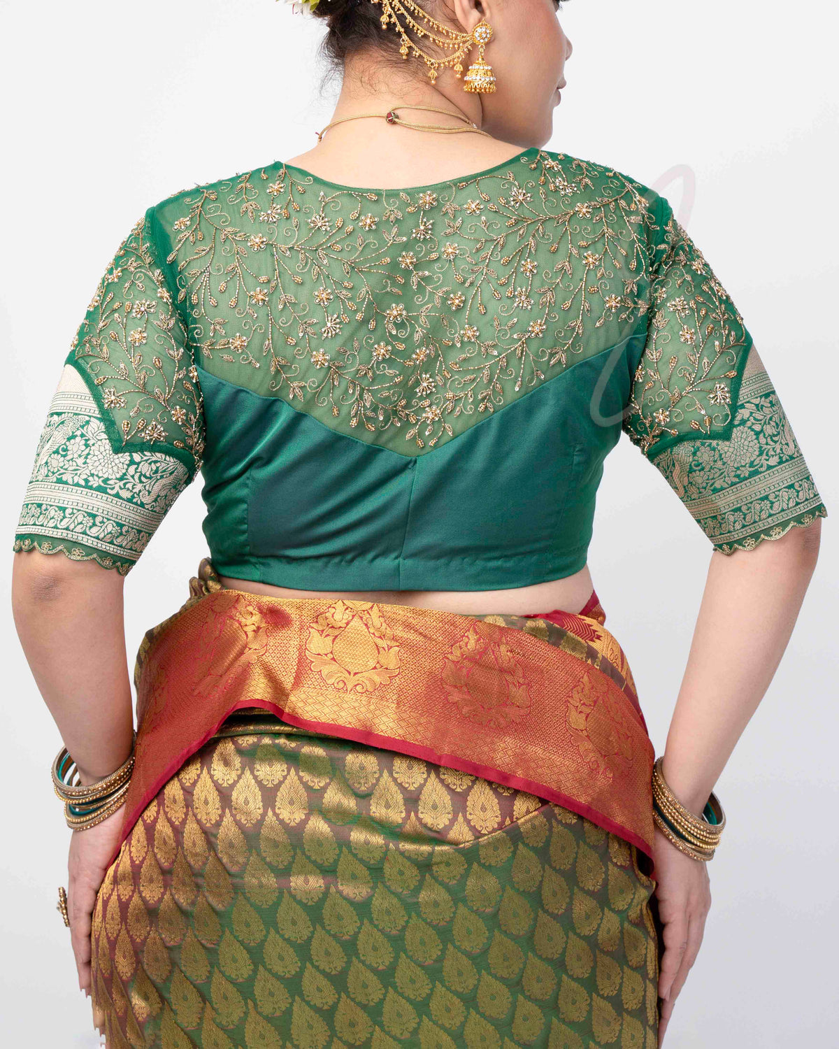 A green silk cotton with net blouse
