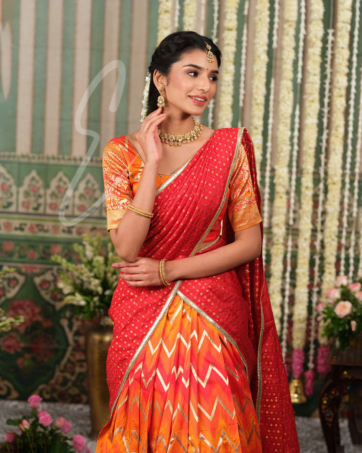 Red and orange Banarasi silk half saree with intricate woven detailing