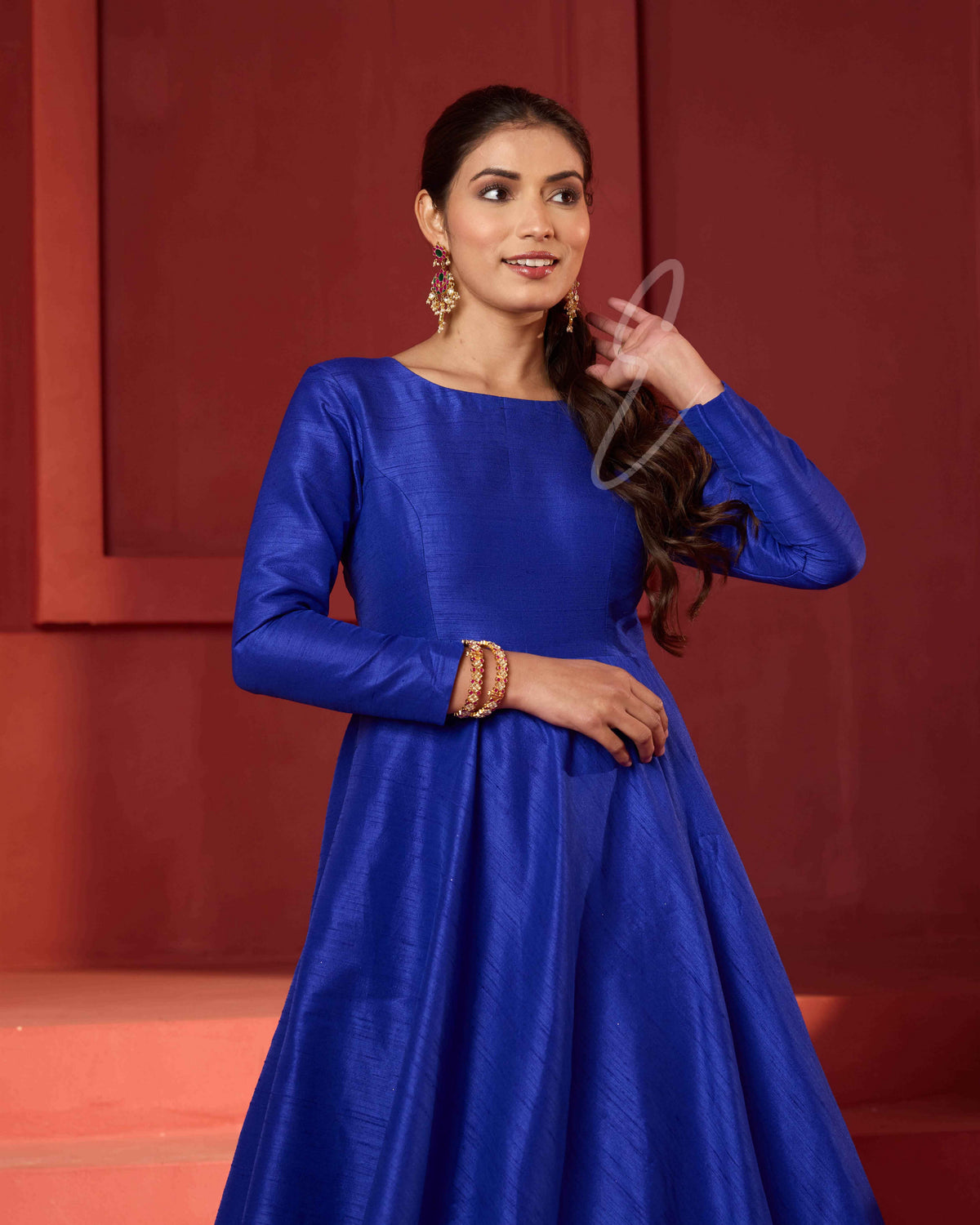 A dark blue raw silk gown